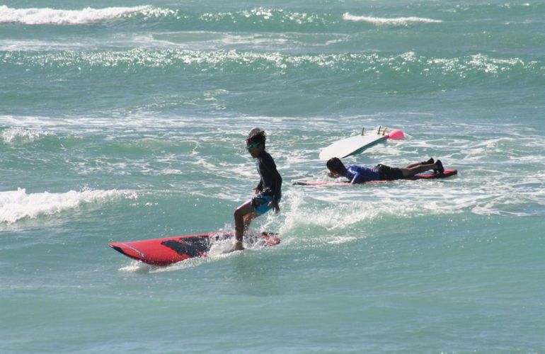 Hawaiian Fire Surf Lessons and Tour