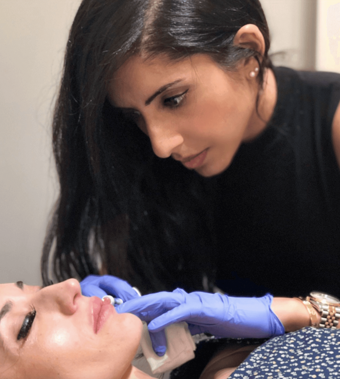 Dr. Mahmood with a patient