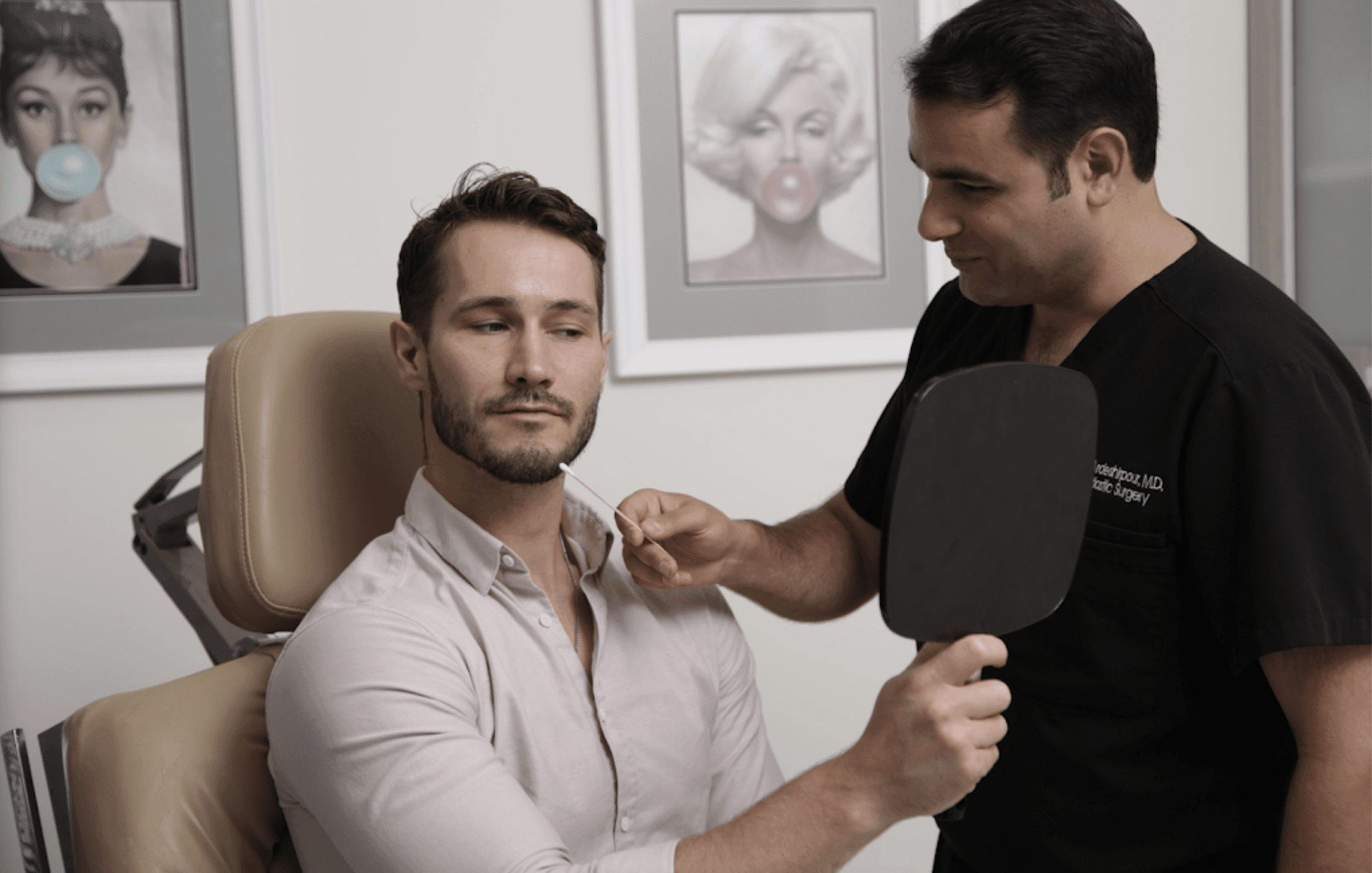 Dr. Ardeshirpour with a patient at his practice