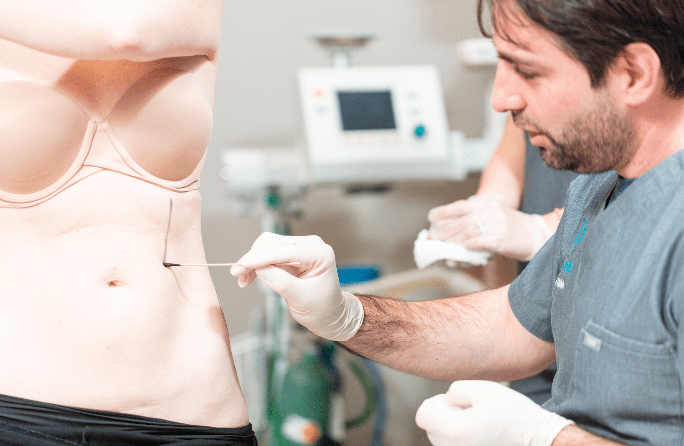 Dr. Khalifeh with a patient in the OR before surgery