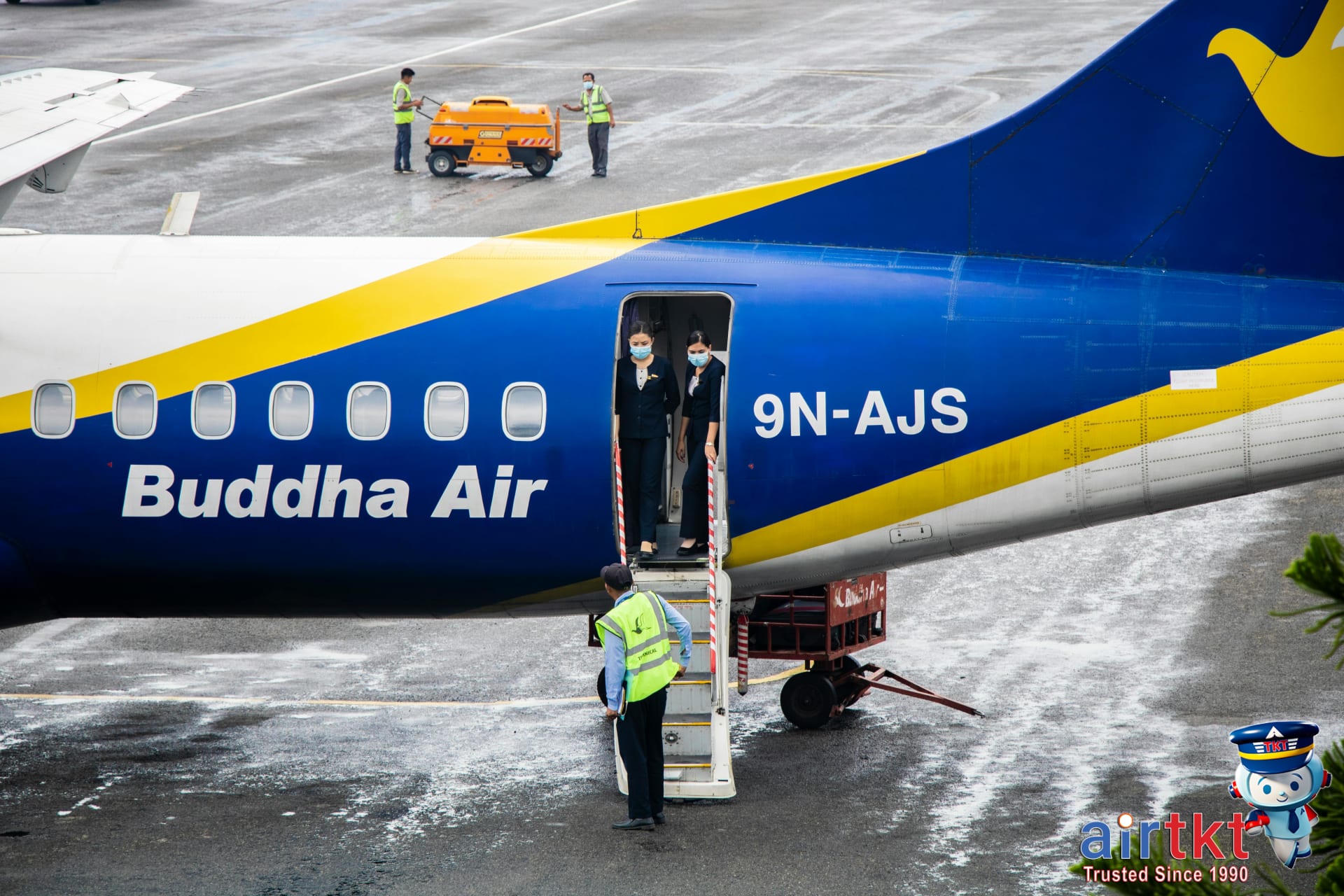 Traveler using phone at airport terminal