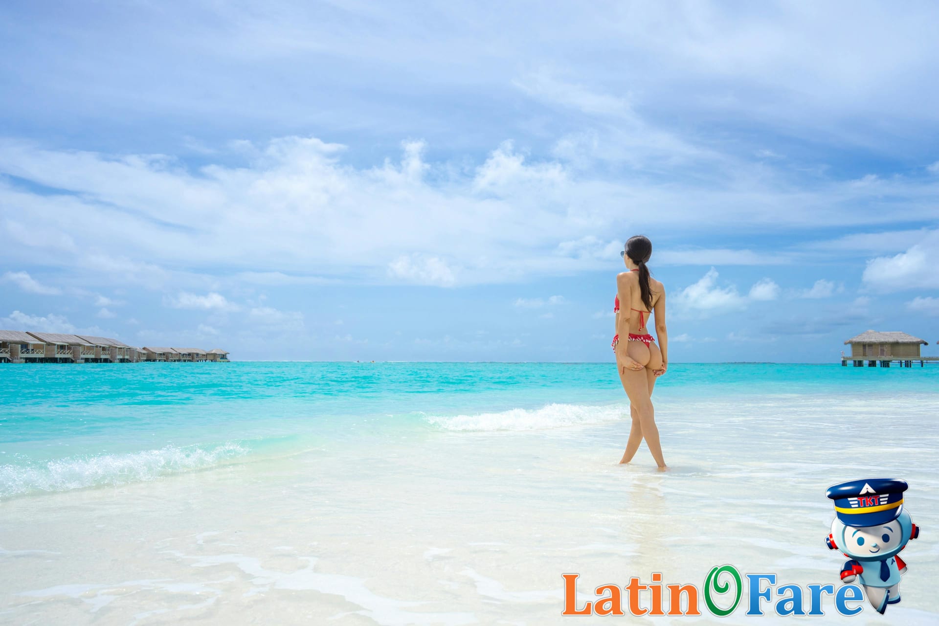 Woman enjoying tropical beach with clear turquoise waters