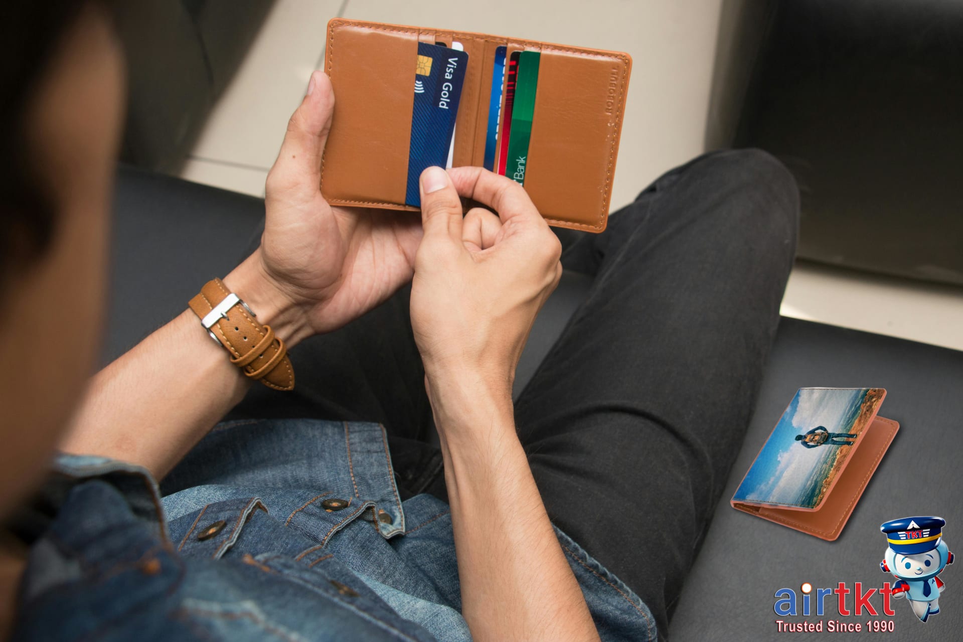 Traveler using credit card with city background