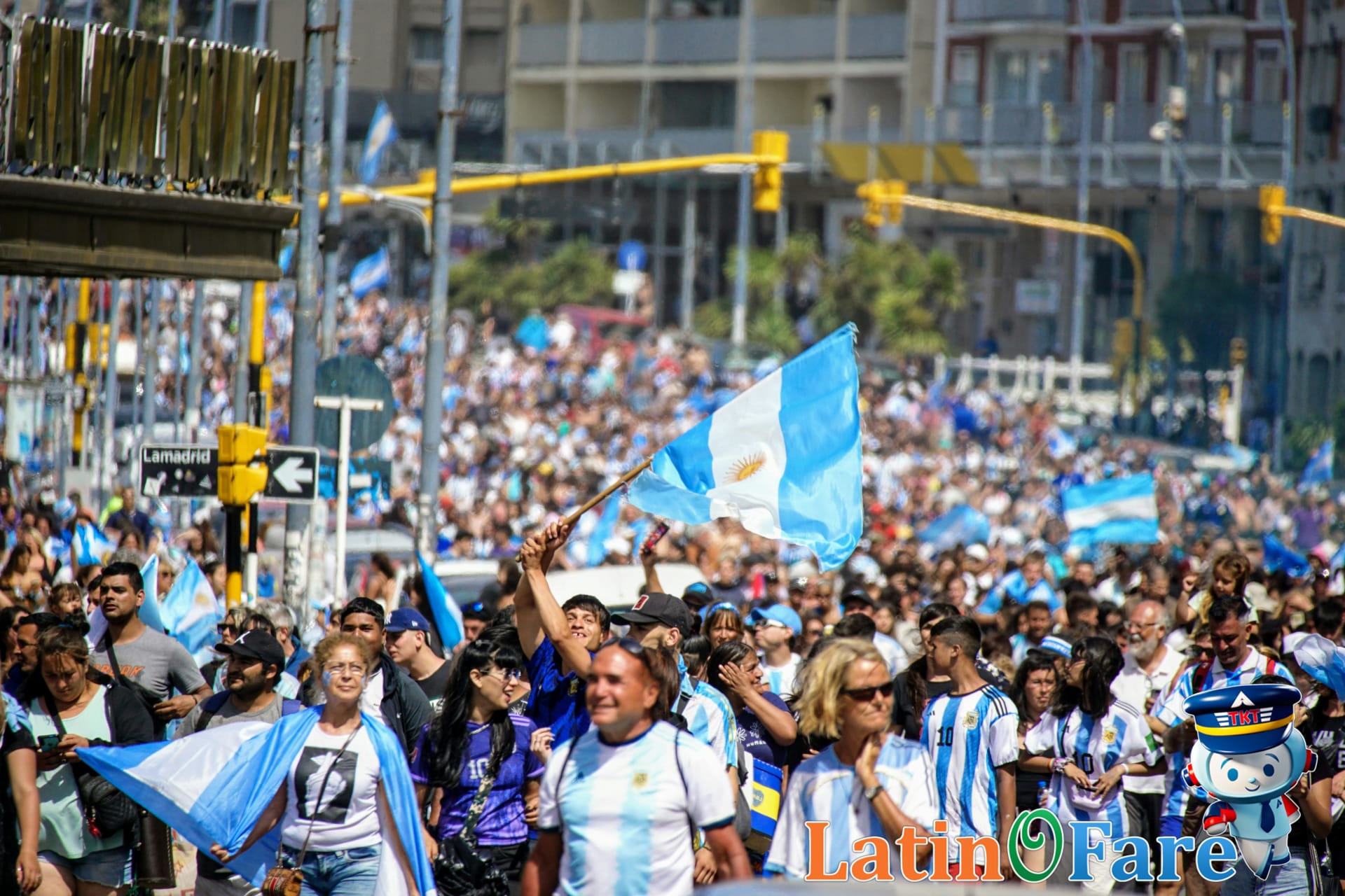Festival crowd dense but organized in open area