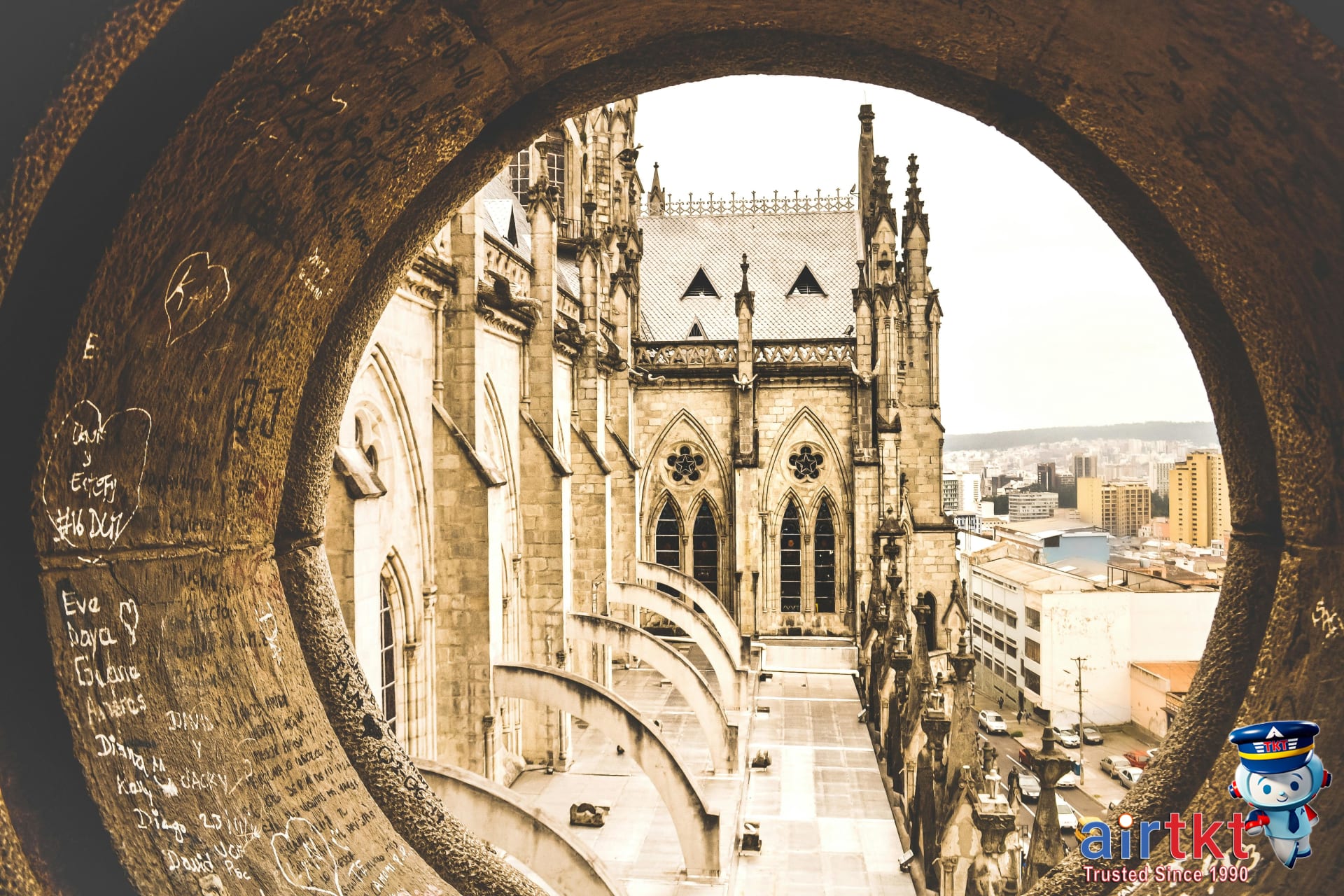 Scenic view of Basilica del Voto Nacional in Quito with city backdrop