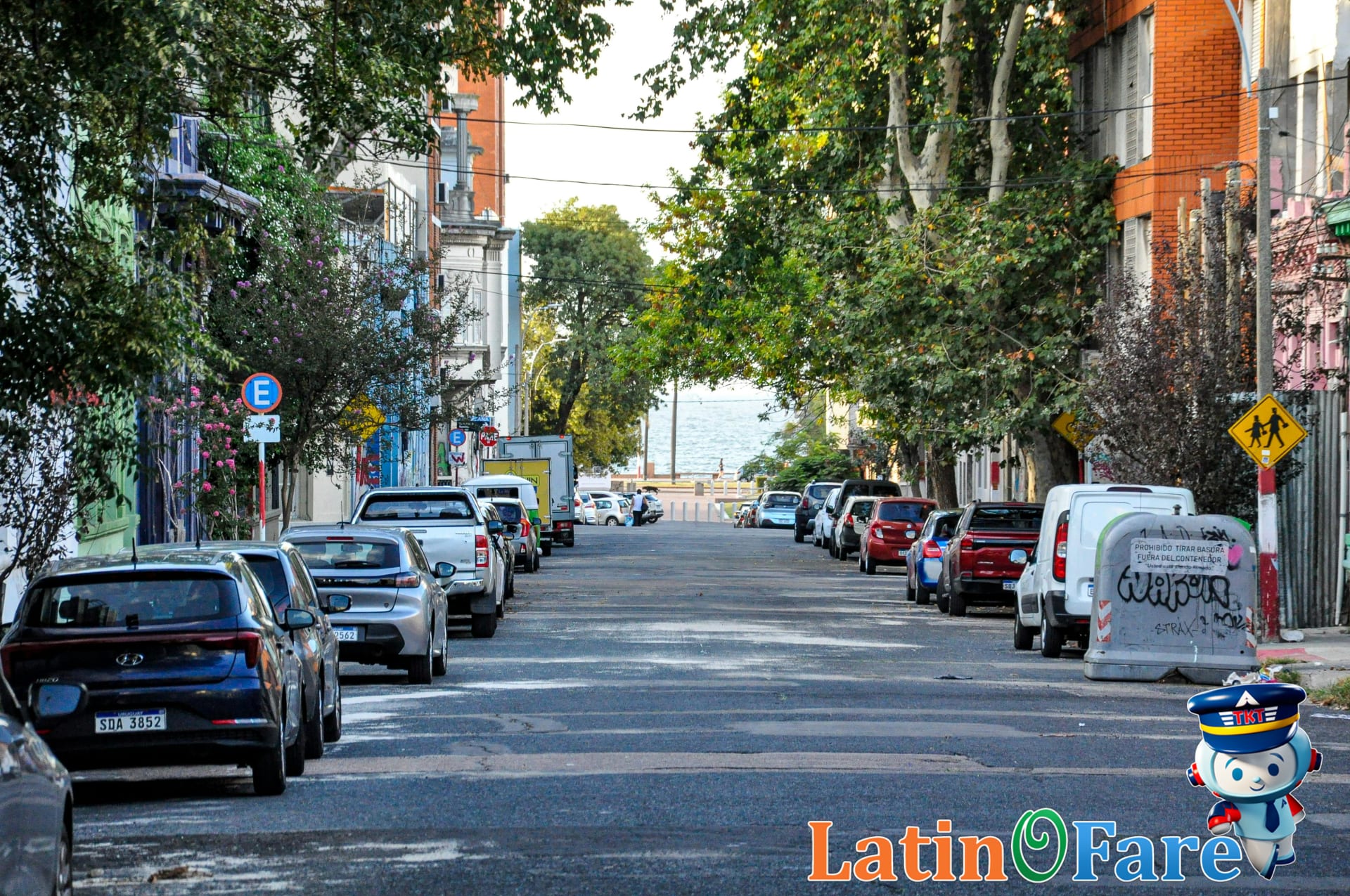 Quaint street in Montevideo with colorful historic buildings and pedestrians
