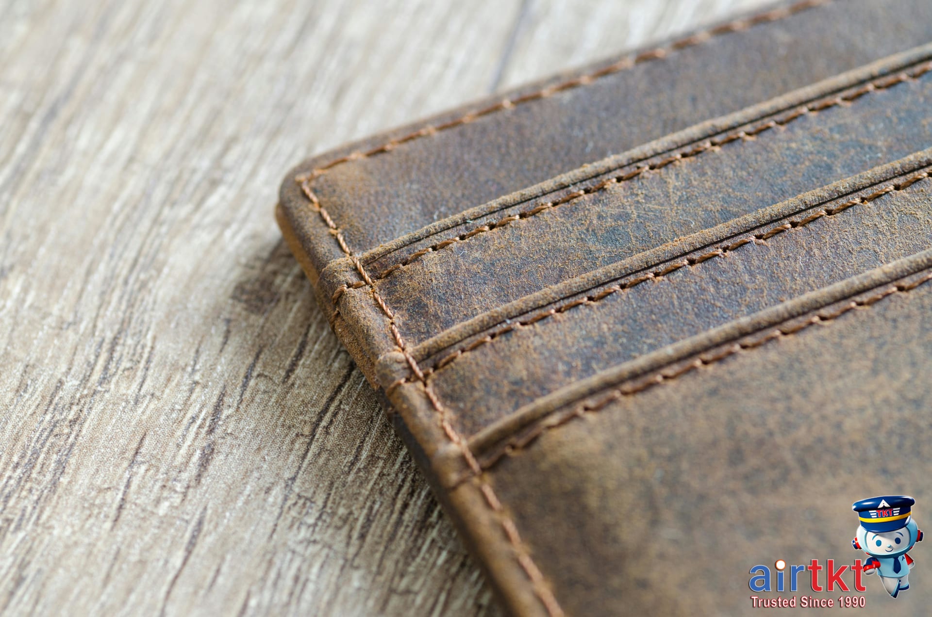 Brown leather wallet showing RFID blocking travel accessories
