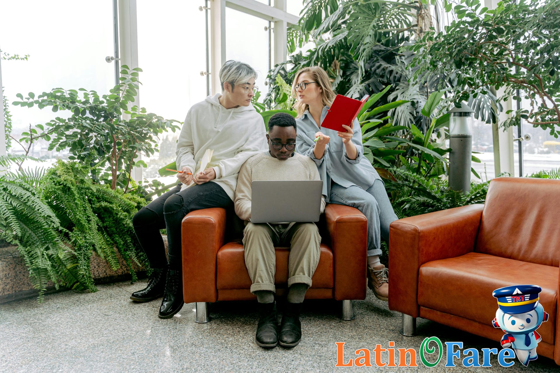 Travelers booking flights online using a laptop at home