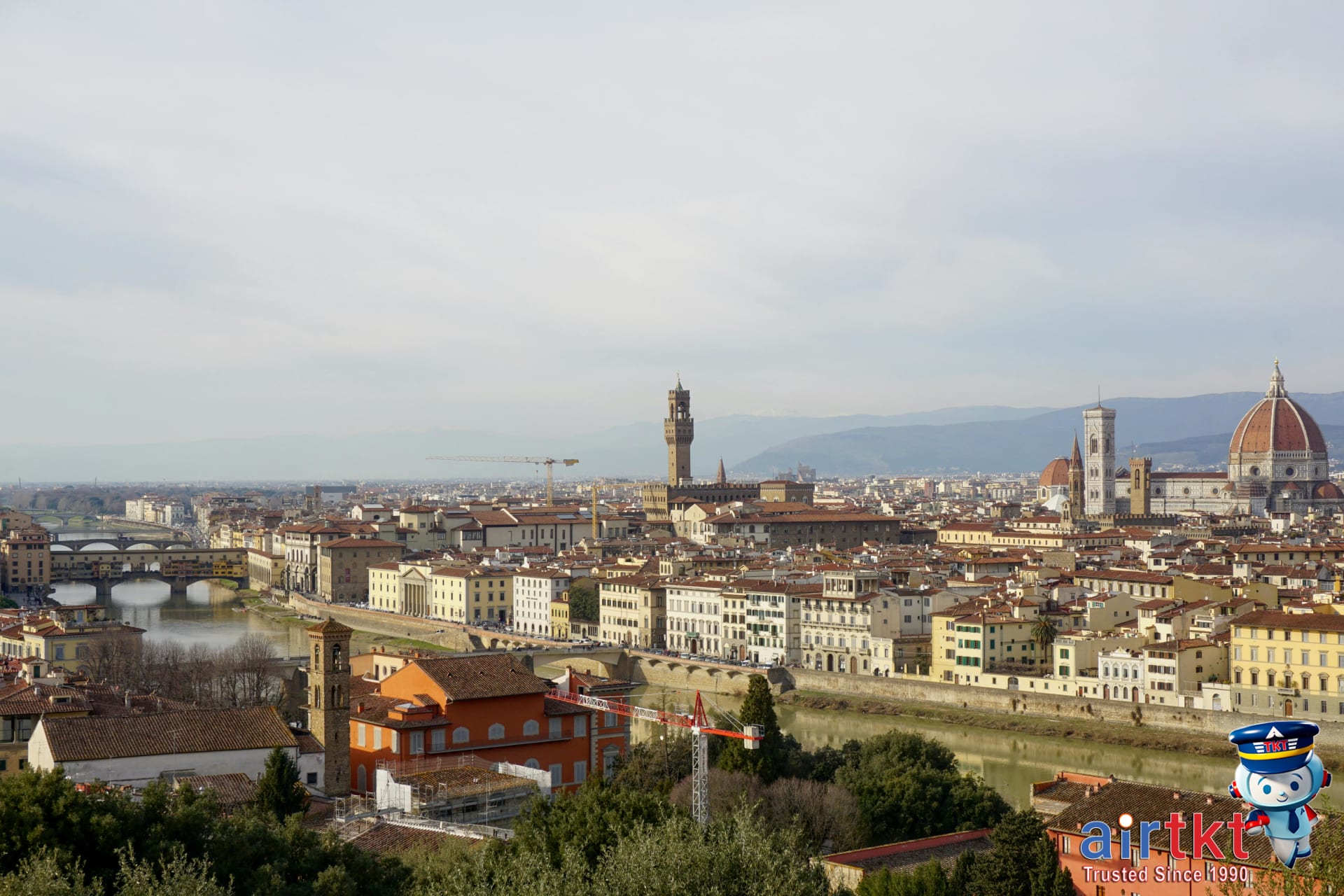 Tuscany rolling hills and vineyards at sunset