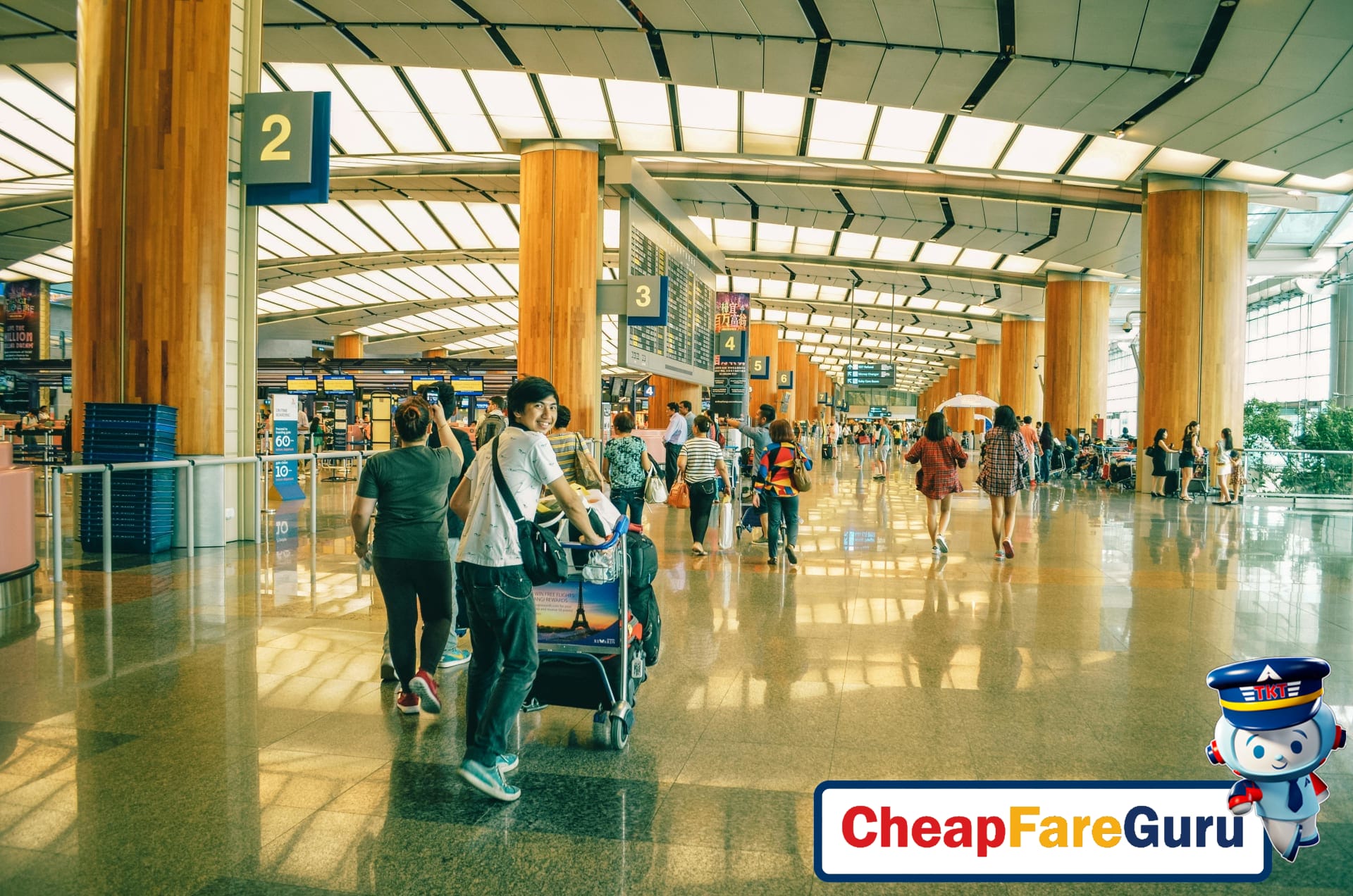 Traveler wearing noise-canceling headphones at airport