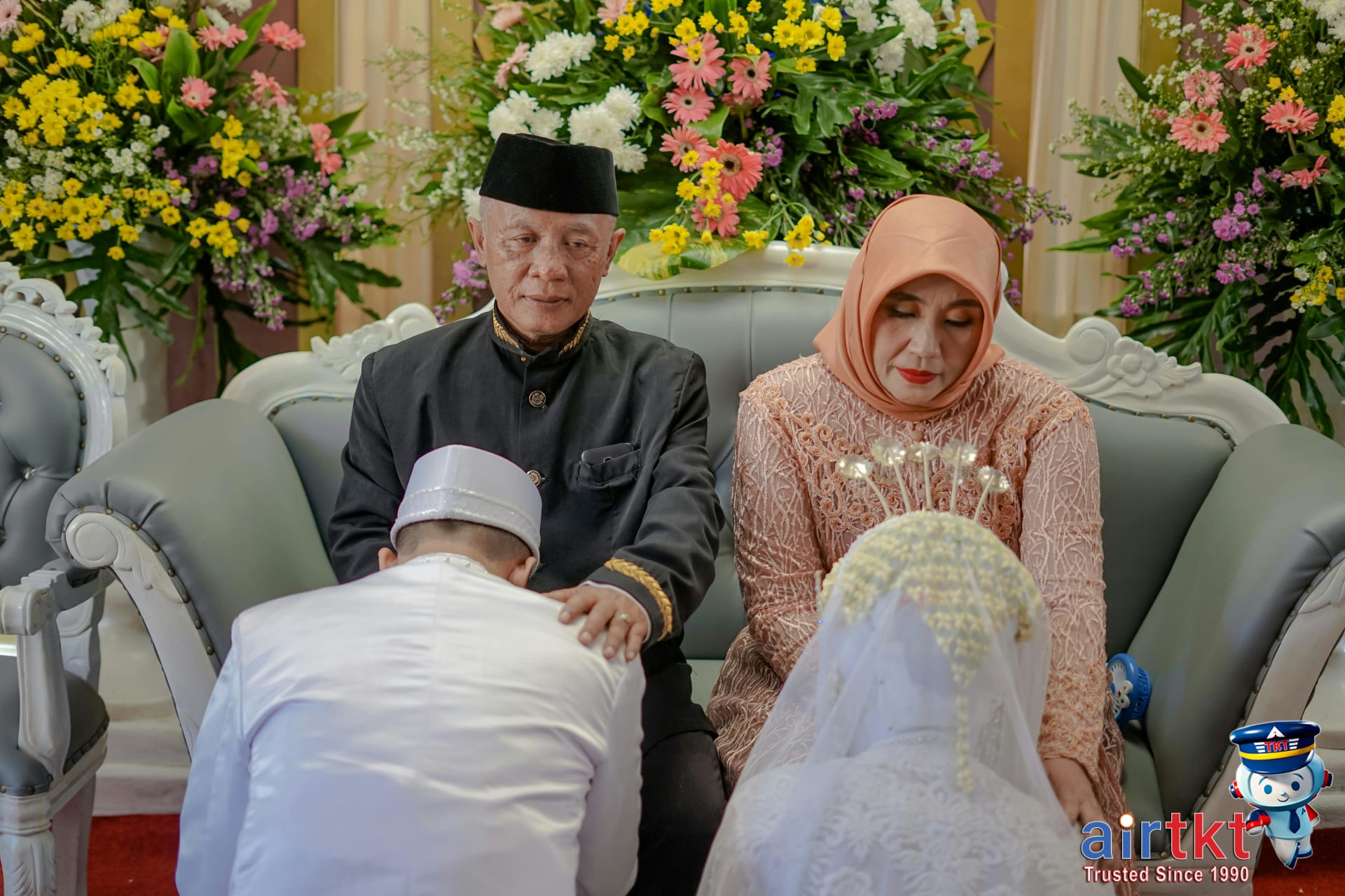 Filipino elder receiving mano gesture