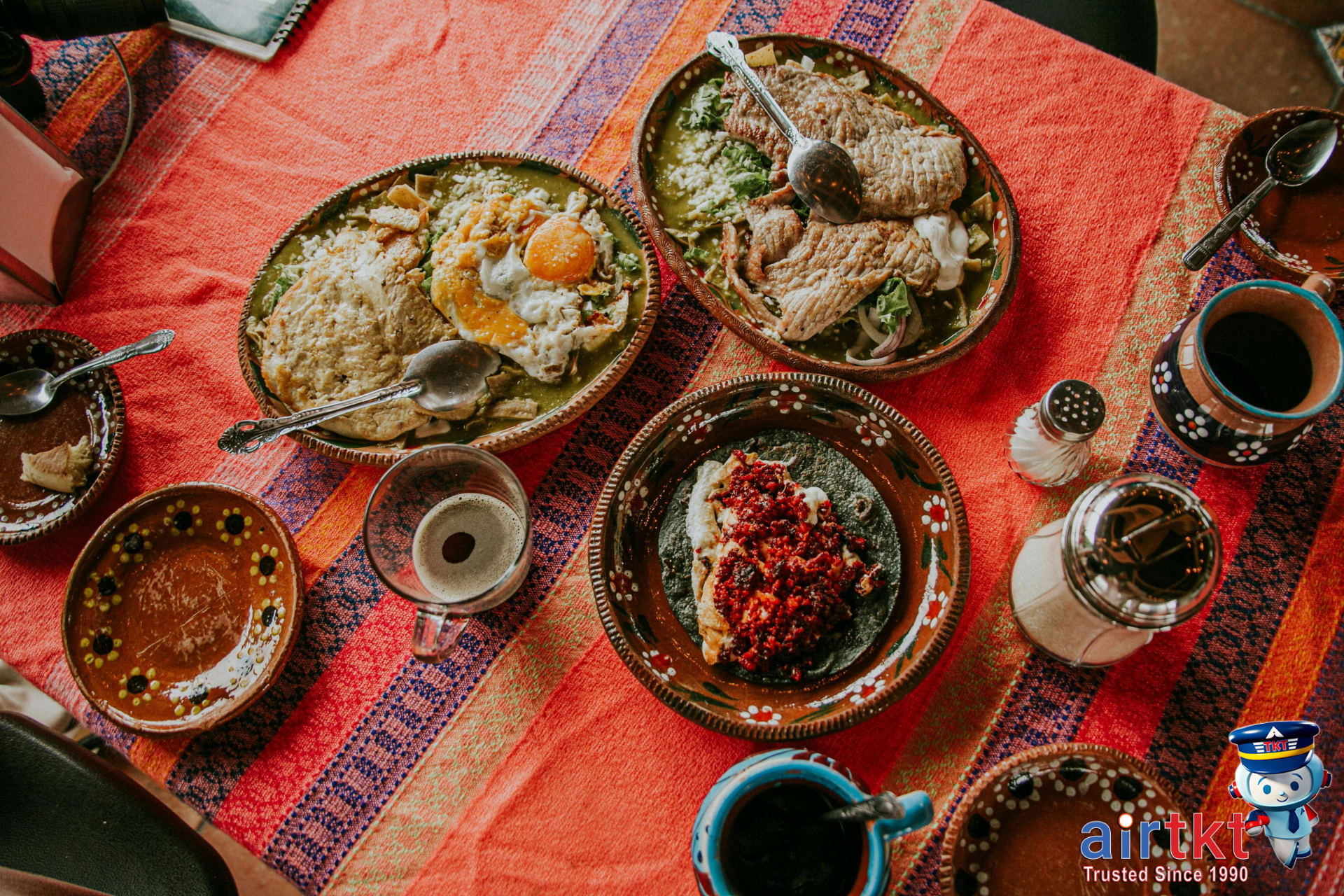 Diverse Mexican dishes on a table showing dining customs and meal etiquette in Mexico