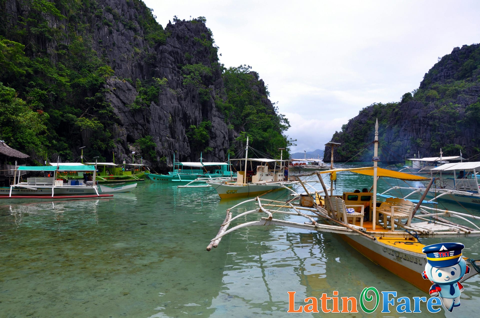 Colorful boats moored in El Nido, representing island arrival for Philippines flights and entry.