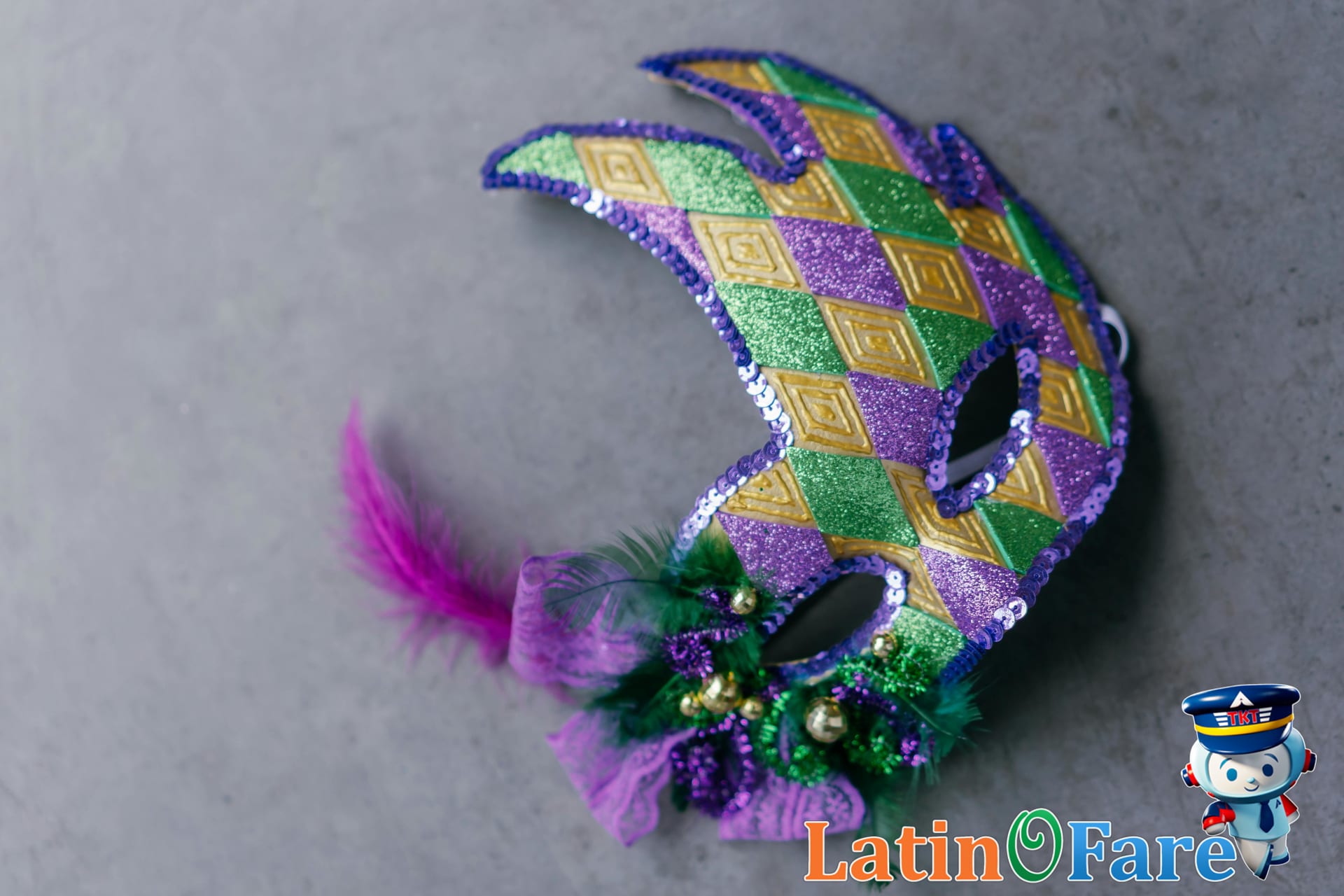 Closeup of traditional colorful Mardi Gras mask with festive feathers