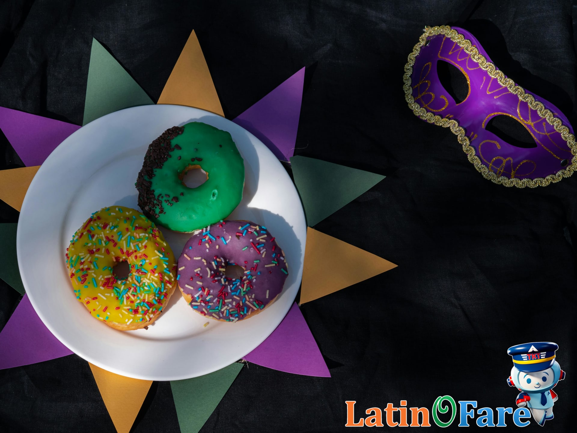 King cake with Mardi Gras colors in New Orleans bakery display