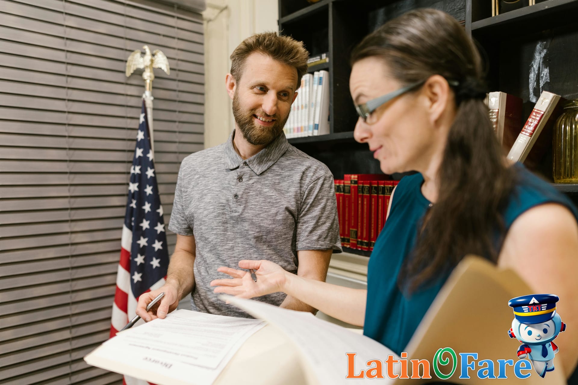 Traveler discussing bag screening with TSA officer at U.S. airport