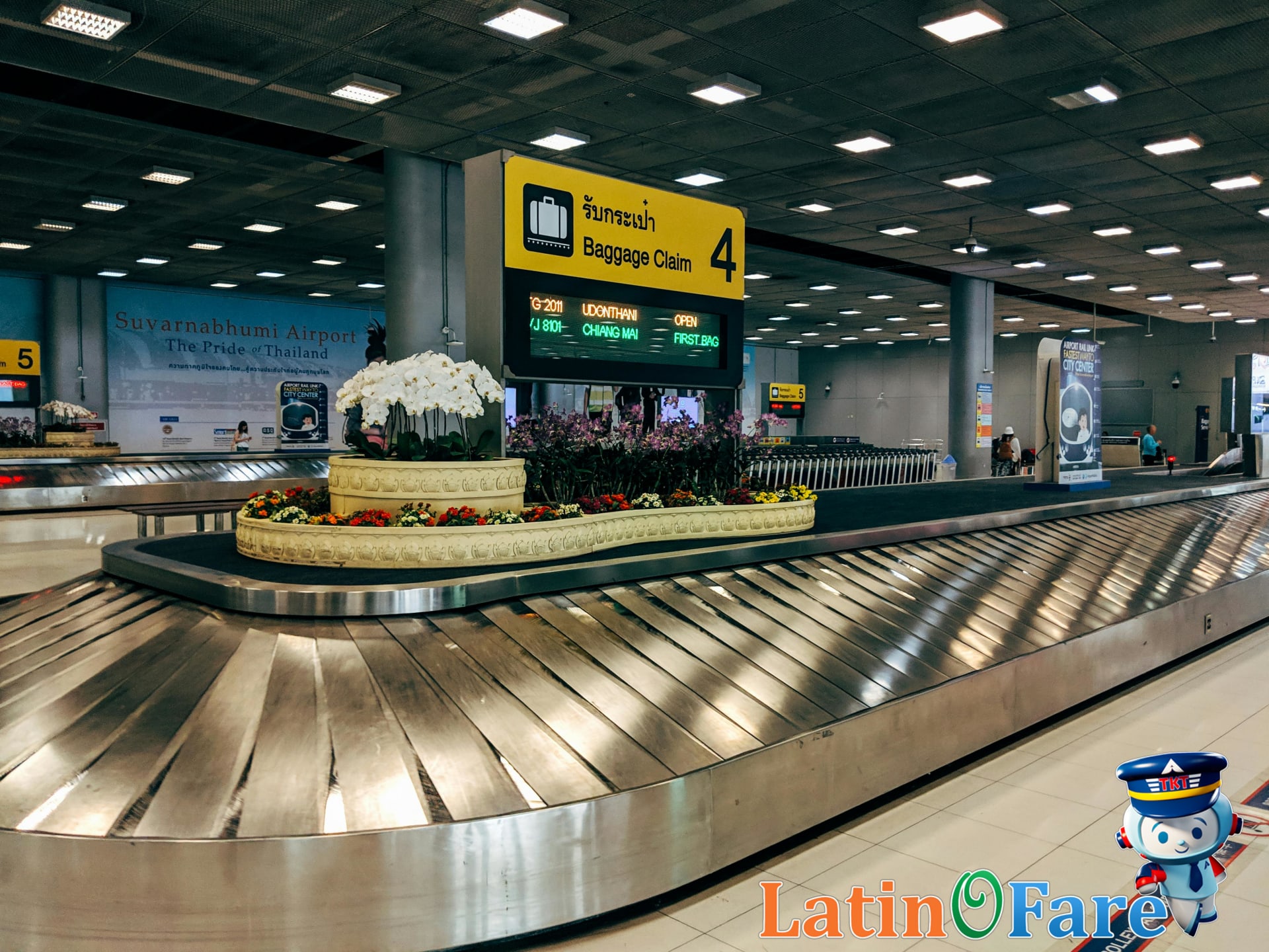 Preparing bins for TSA screening with travel tips in USA airport
