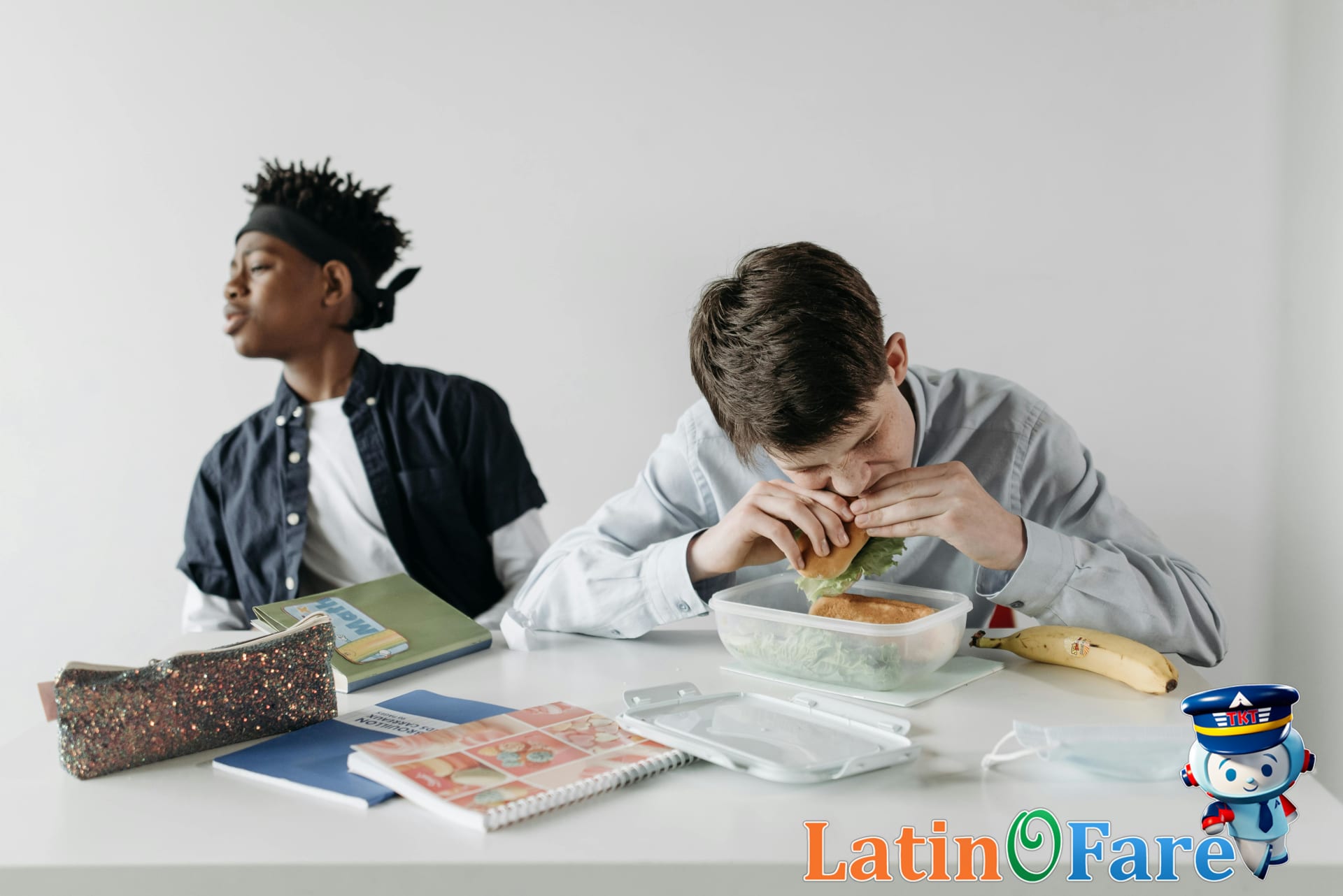 College students enjoying budget street food from a vendor during spring break trip.