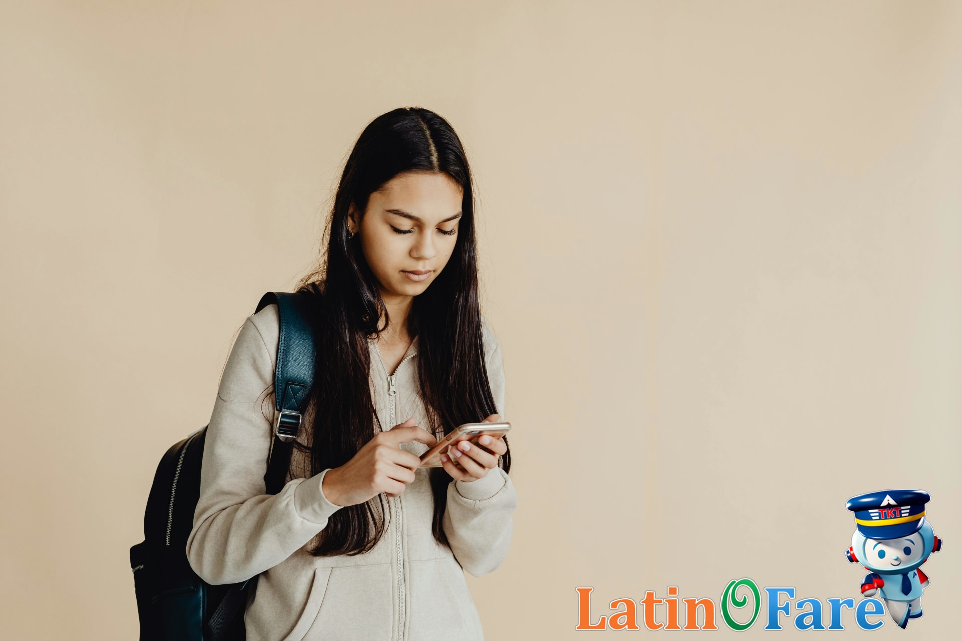 Student using a smartphone app for booking affordable spring break flights at home.