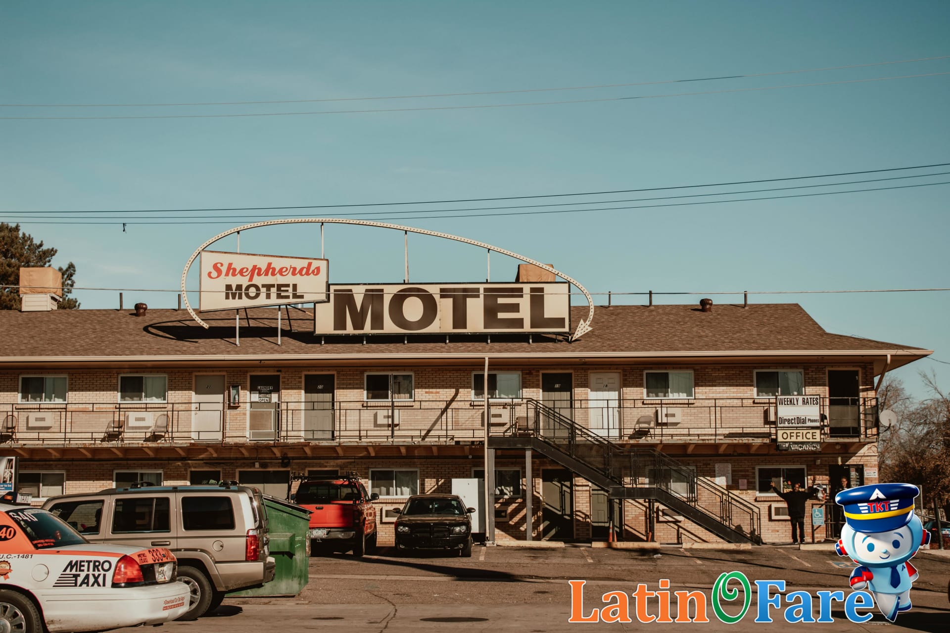 Affordable Indio accommodation options with a motel near Coachella festival venue at dusk.