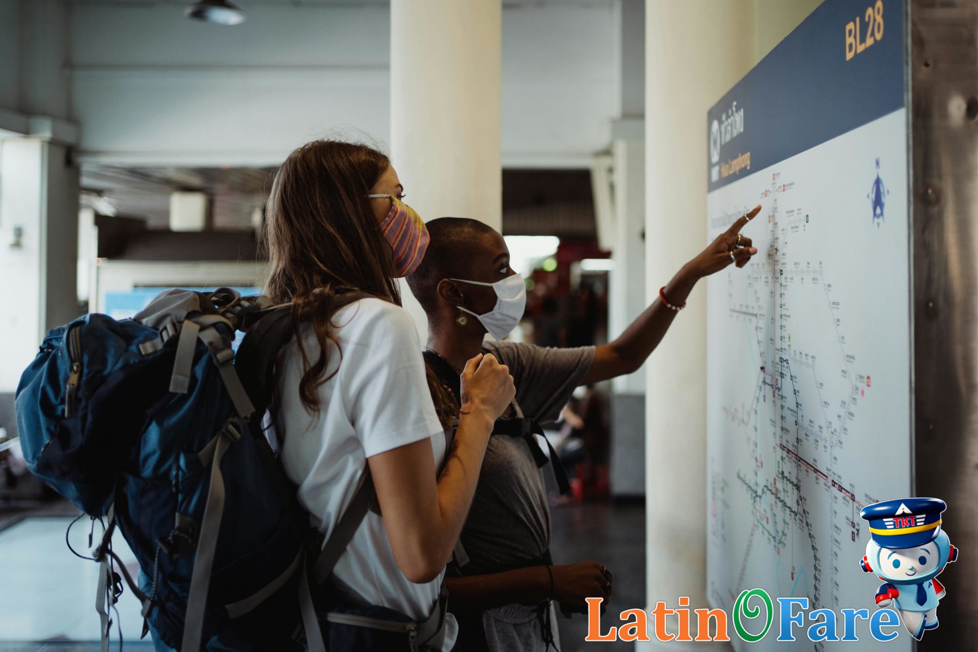 Backpackers planning Gringo Trail route in a vibrant South American station