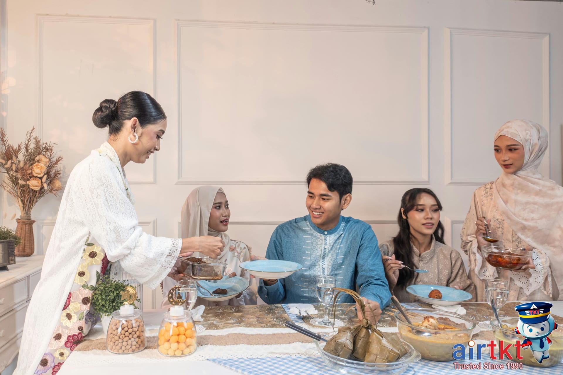 Family celebrating Eid al-Adha with traditional dishes in Muslim-friendly city