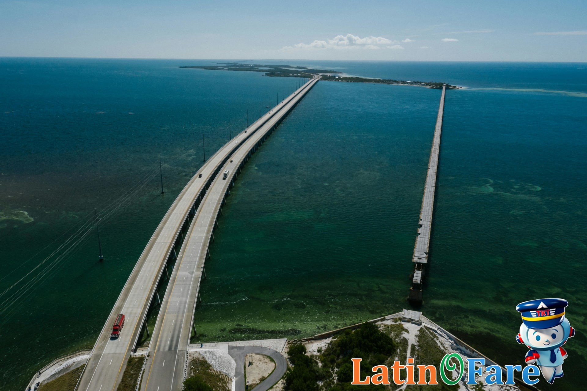 Scenic walk on Seven Mile Bridge in the Florida Keys with sweeping ocean views and blue sky.