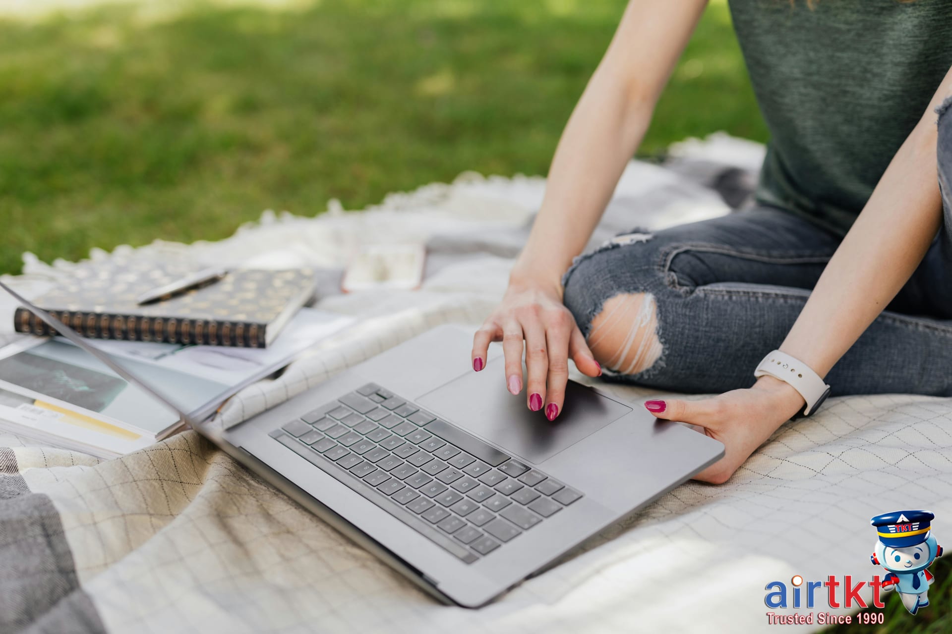 Student searching cheap flight deals on a laptop for spring break travel