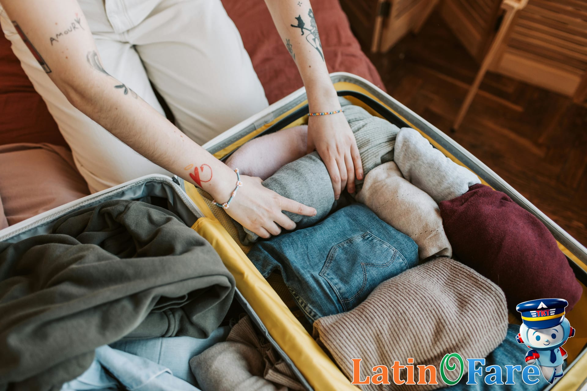 Organized children's travel outfits and shoes laid out for family packing checklist.