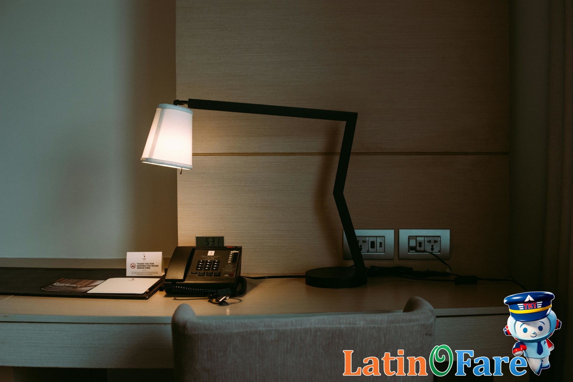 Confident business traveler benefiting from a non-refundable hotel booking in bright room