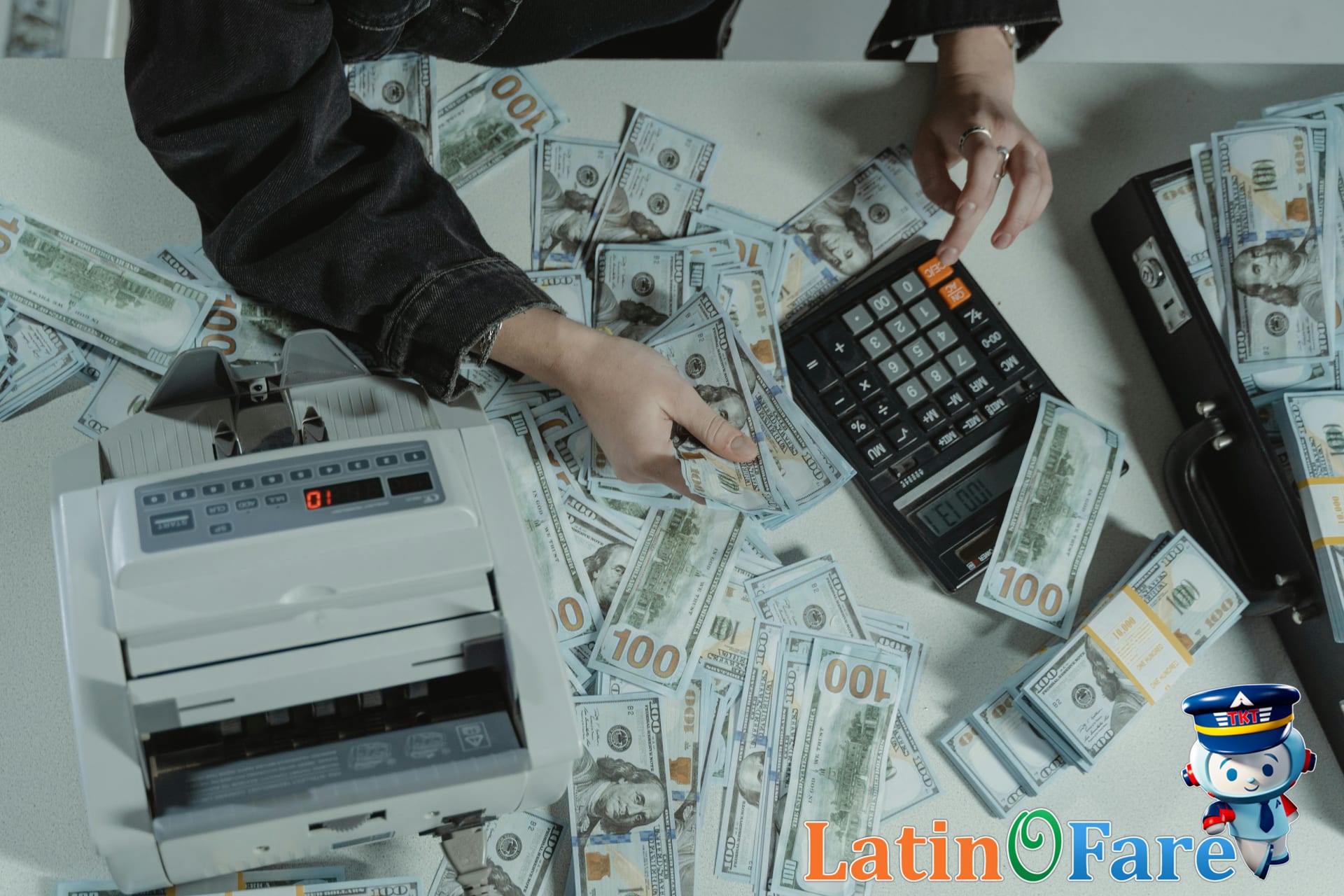 Savings using non-refundable hotel rate calculator money and hotel keycard on table