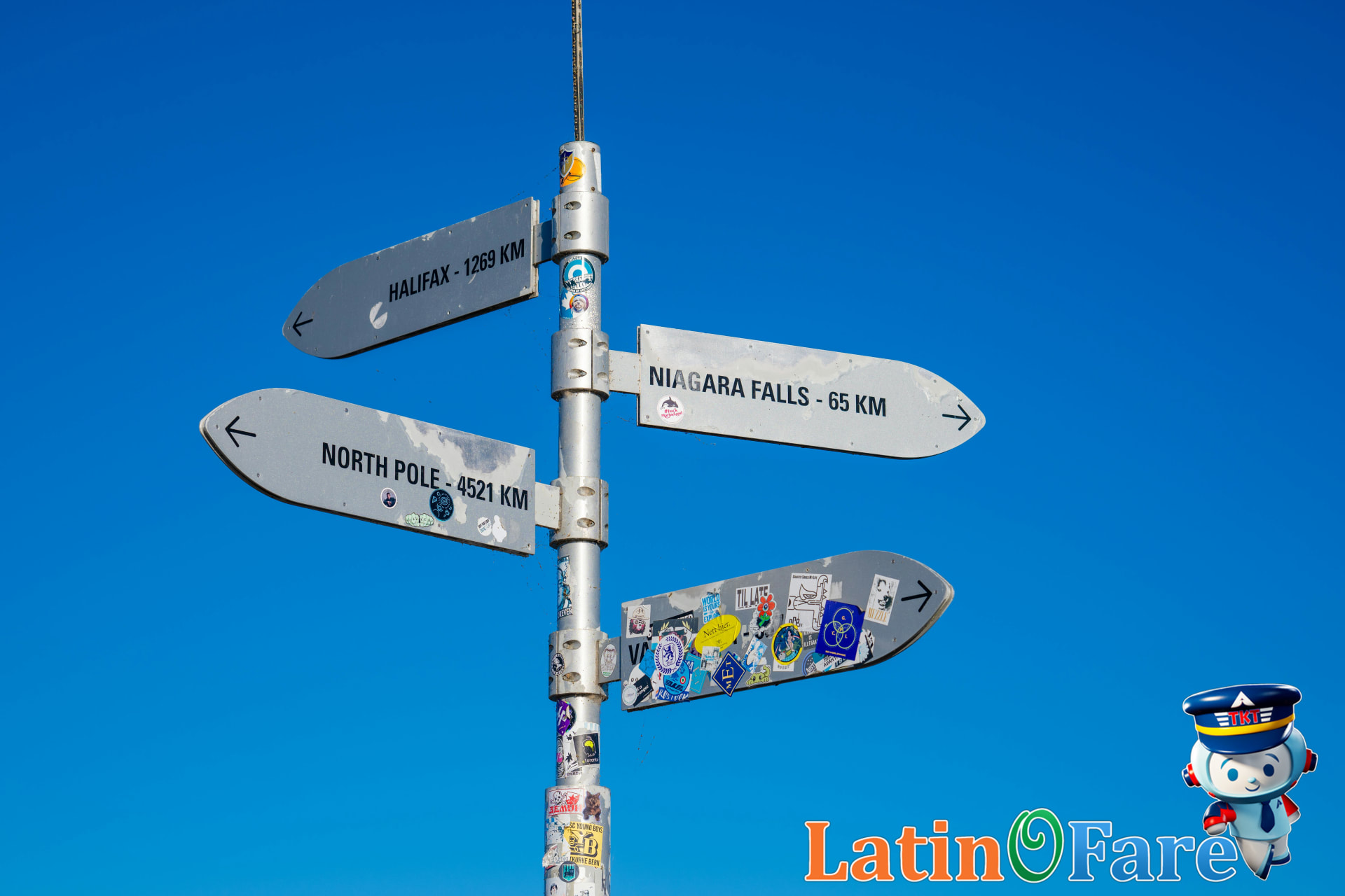 Guide explains Bataan Death March marker during Day of Valor visit to Philippines.