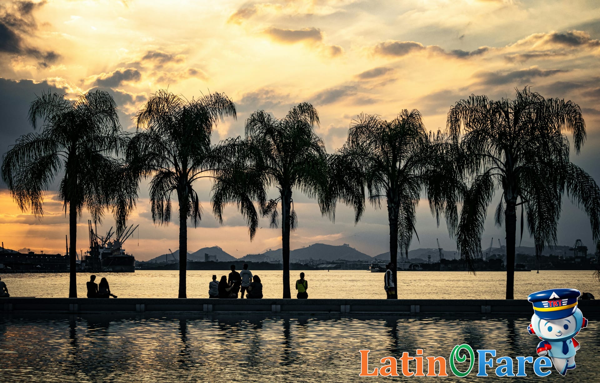 Manila Bay sunset with palm trees and water for Manila travel guide