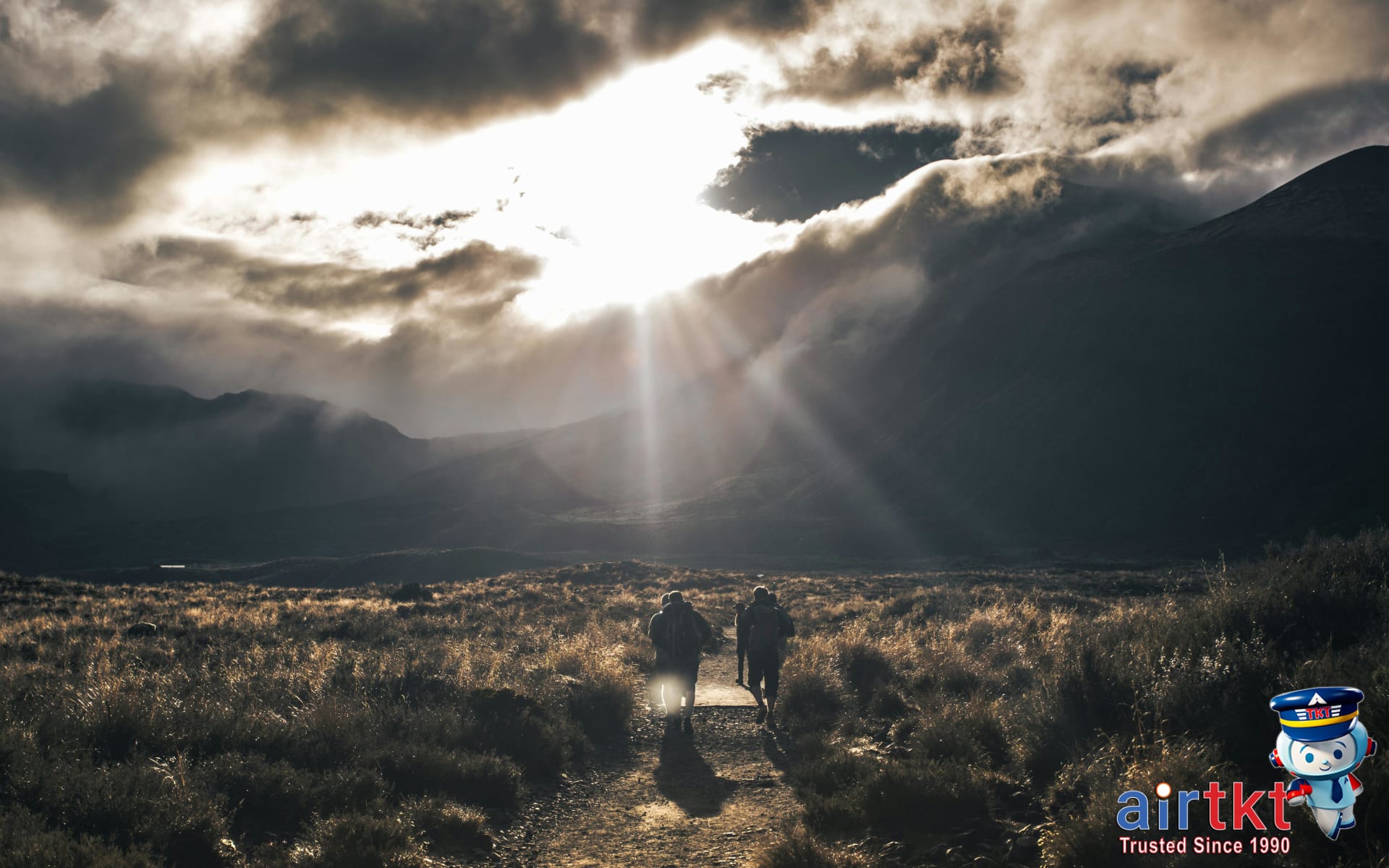 Hikers preparing to ascend Inti Punku Sun Gate trail entrance at Machu Picchu