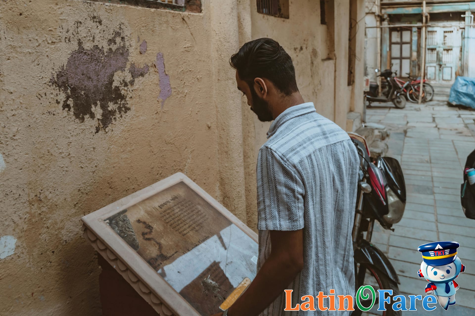 Visitor learns African American history during Juneteenth at historical site reading commemorative plaque