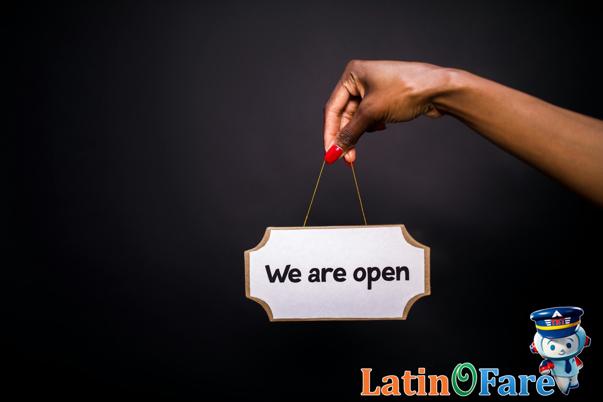Hands holding Juneteenth signs celebrating Black freedom and history, honoring the Juneteenth tradition