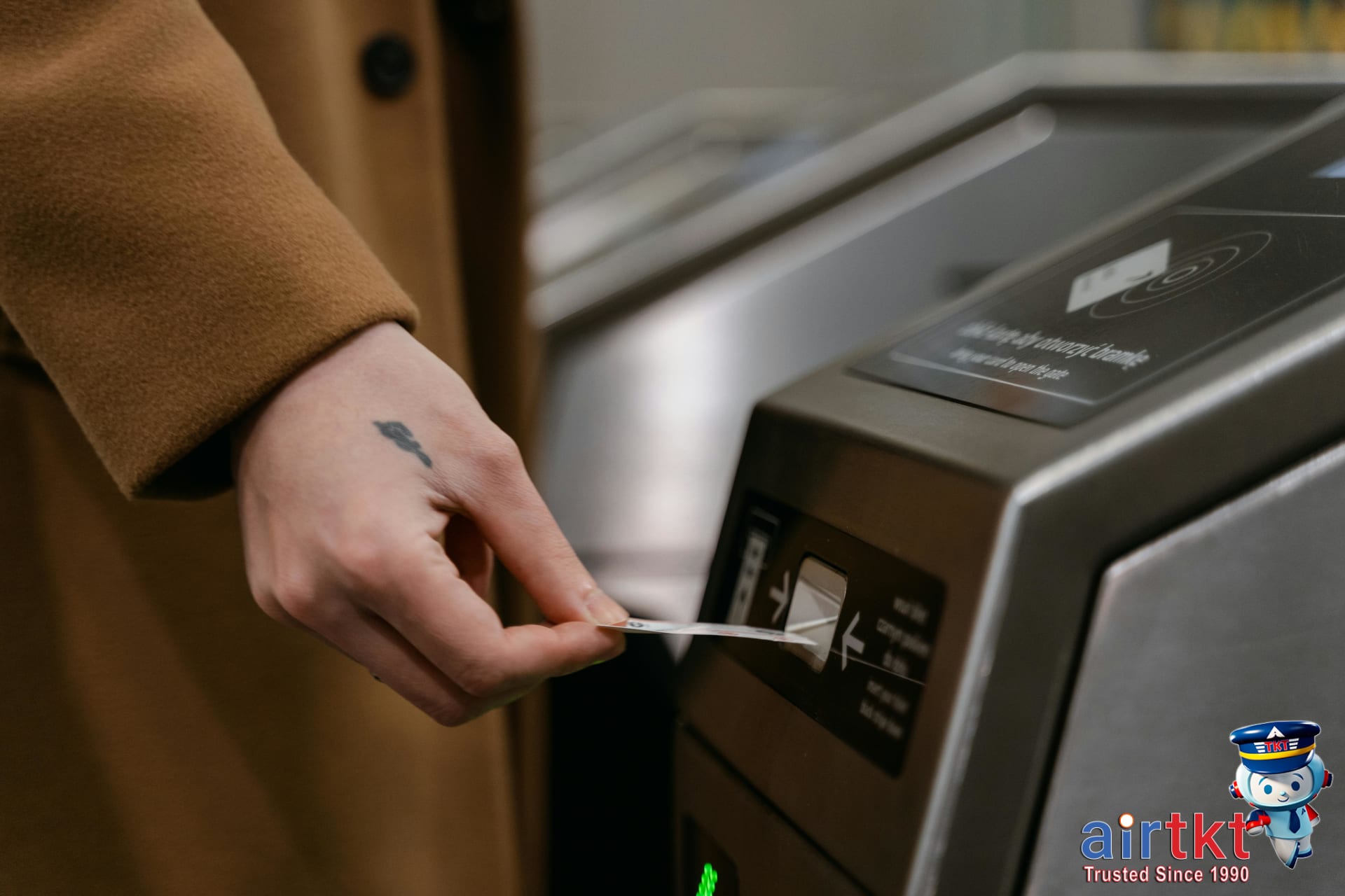 Traveler using Eurail pass at ticket gate in European train station