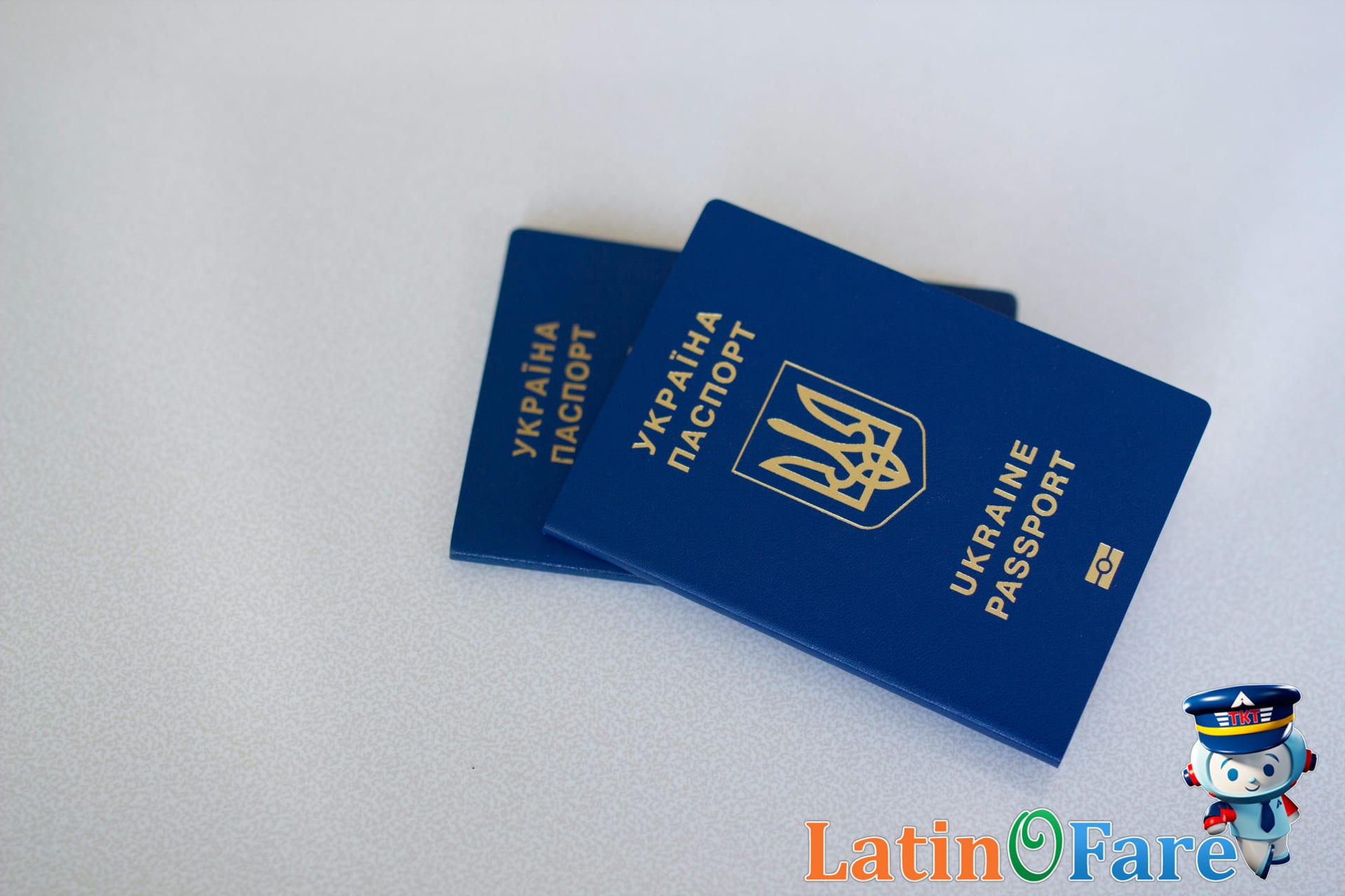 Passport application forms with a US passport, photos, and ID on a travel planner’s desk