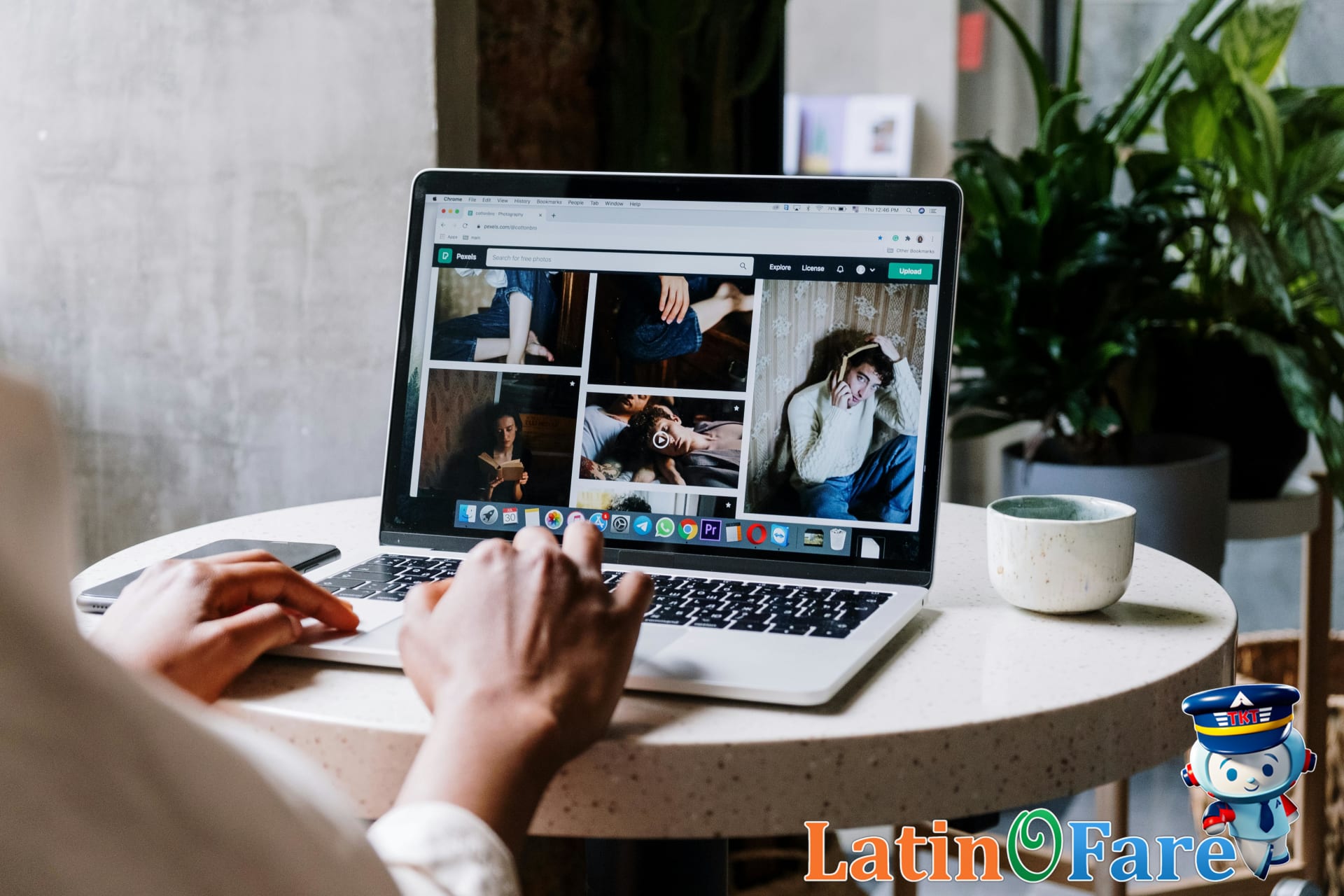 Browsing LatinoFare website booking affordable travel with Capital One Venture X card.