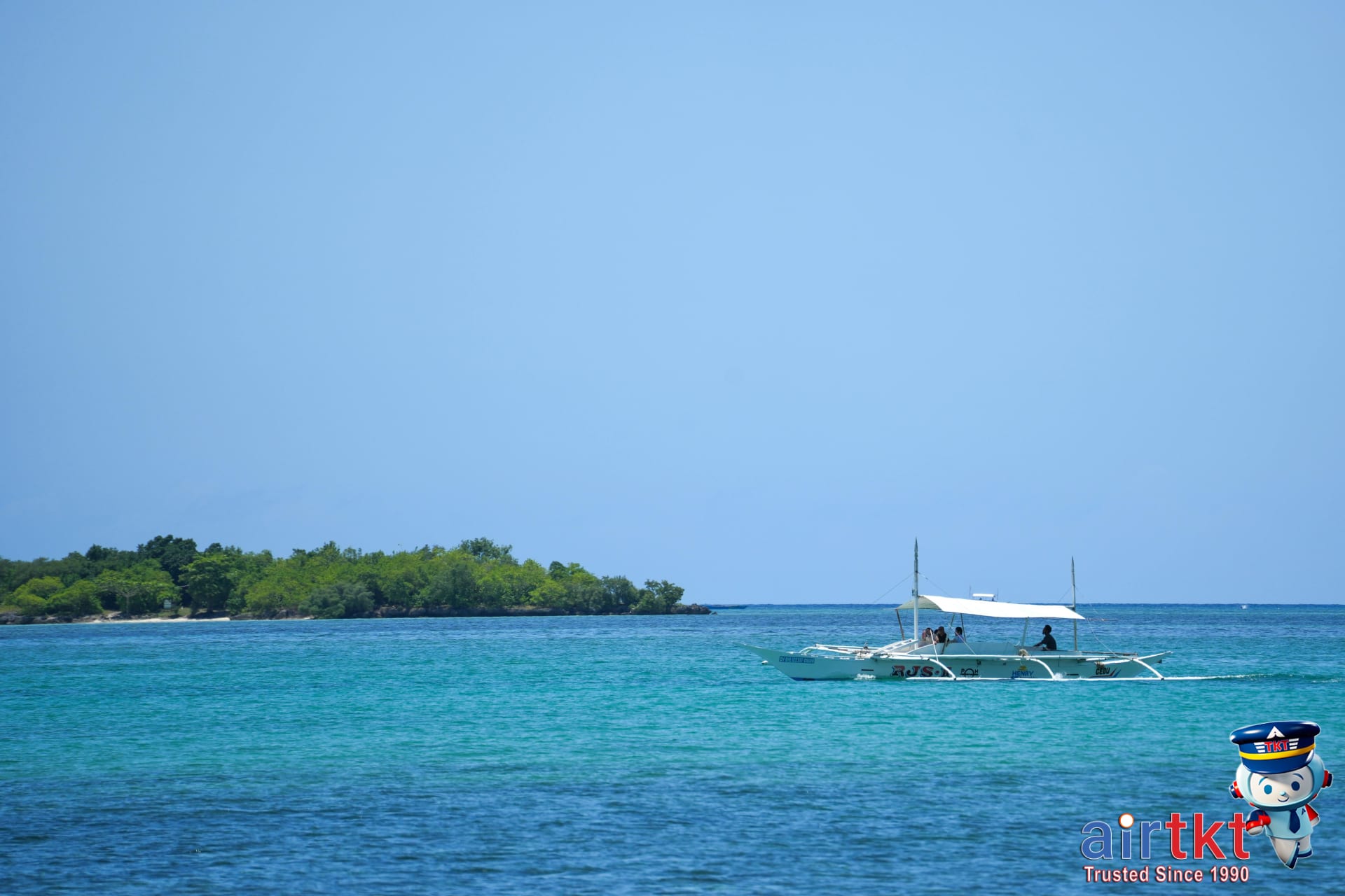 Surfers enjoying sunset waves and beach in Siargao, Philippines
