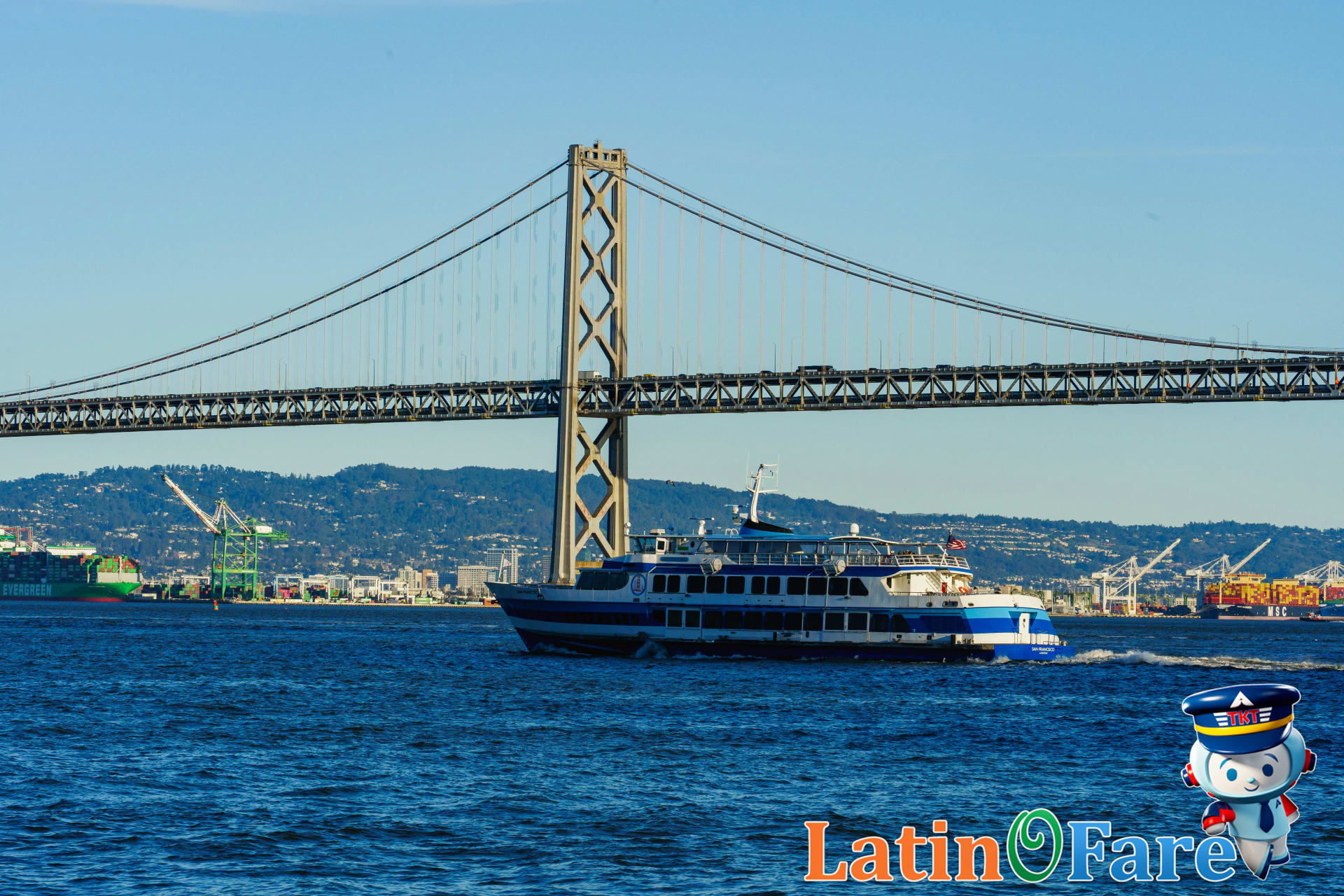 San Francisco ferry service cruising with Bay Bridge in background and city skyline