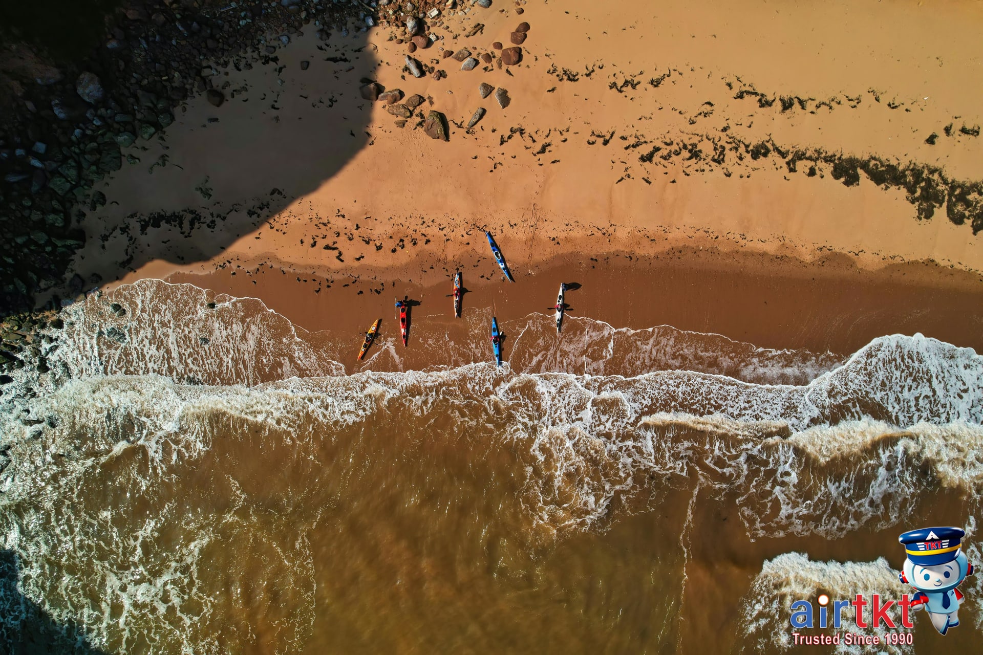 Kayakers exploring calm waters near Outer Banks beaches, supporting activities section