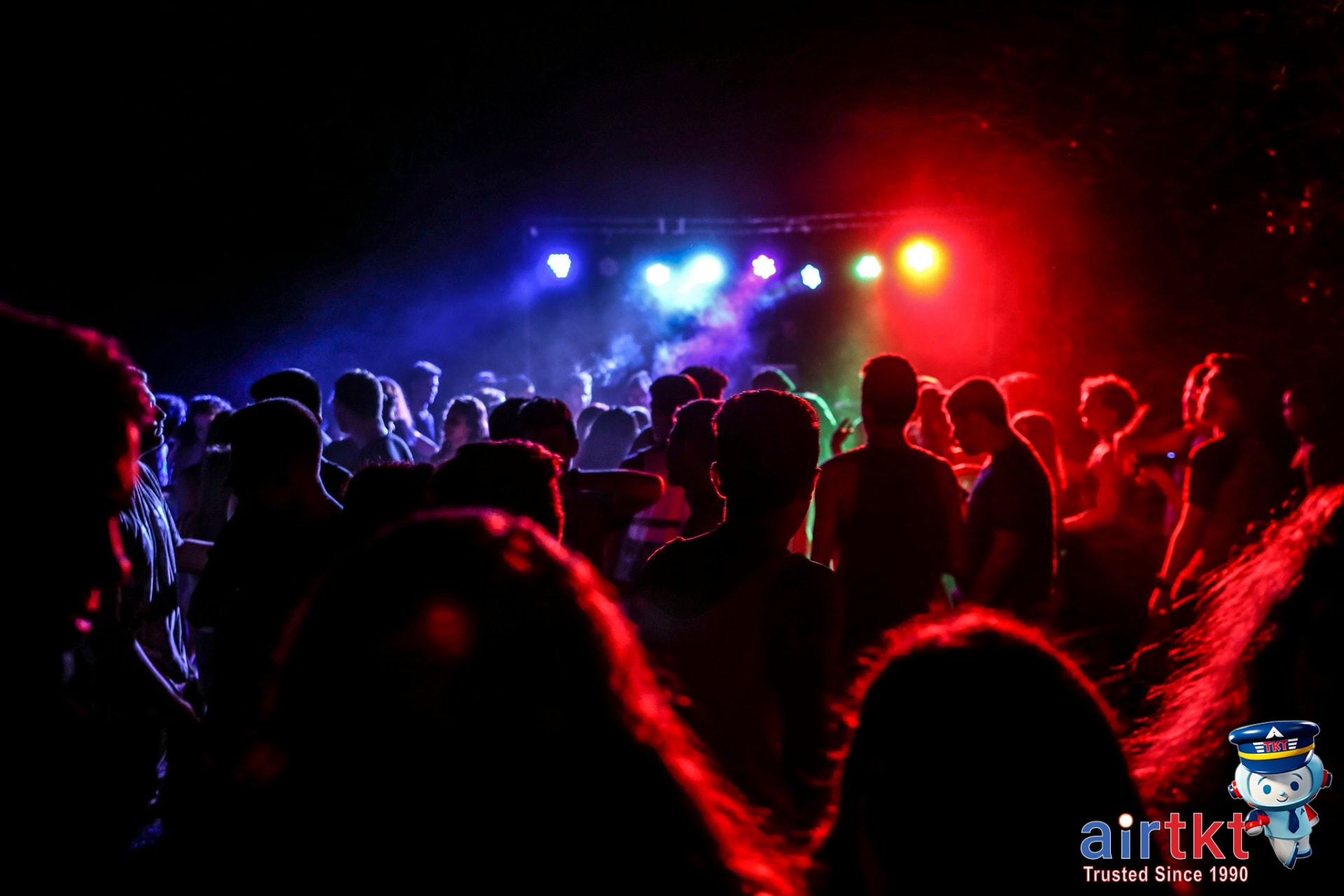Bonnaroo festival night scenes and light shows with energetic crowd