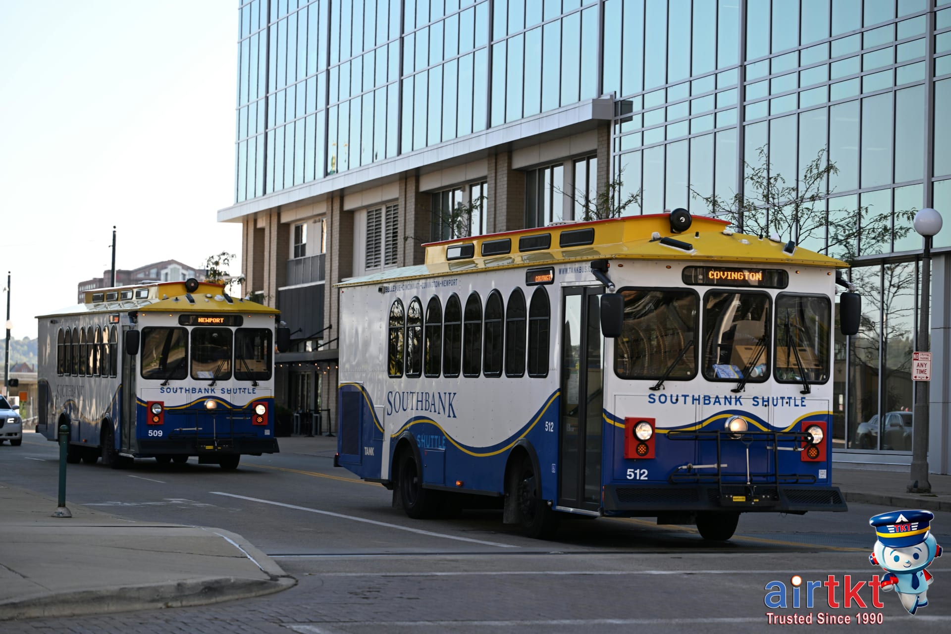 Transportation options for Bonnaroo Tennessee festival with shuttle buses lining up