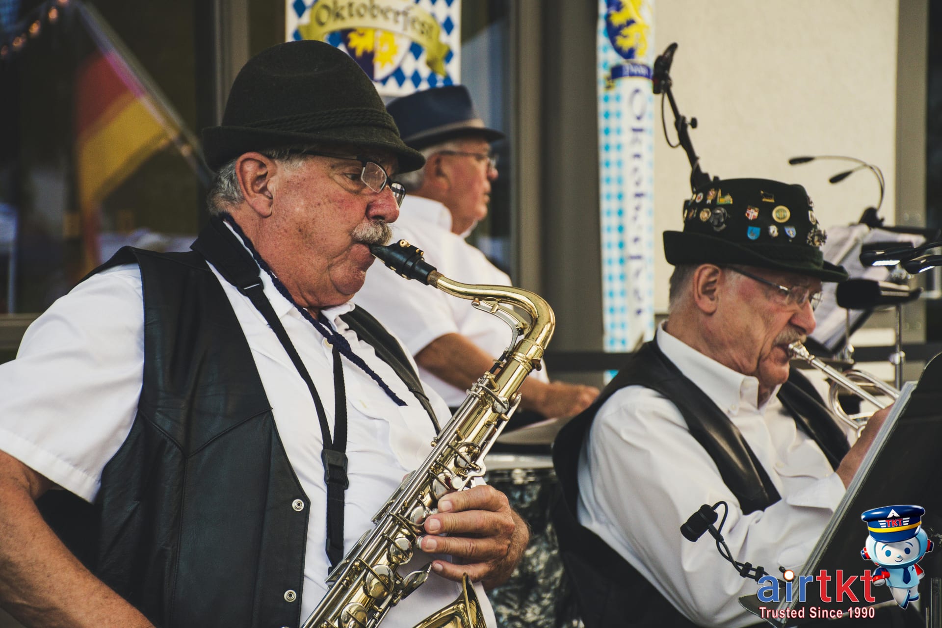Bavarian folk music band performing lively tunes at Munich Oktoberfest