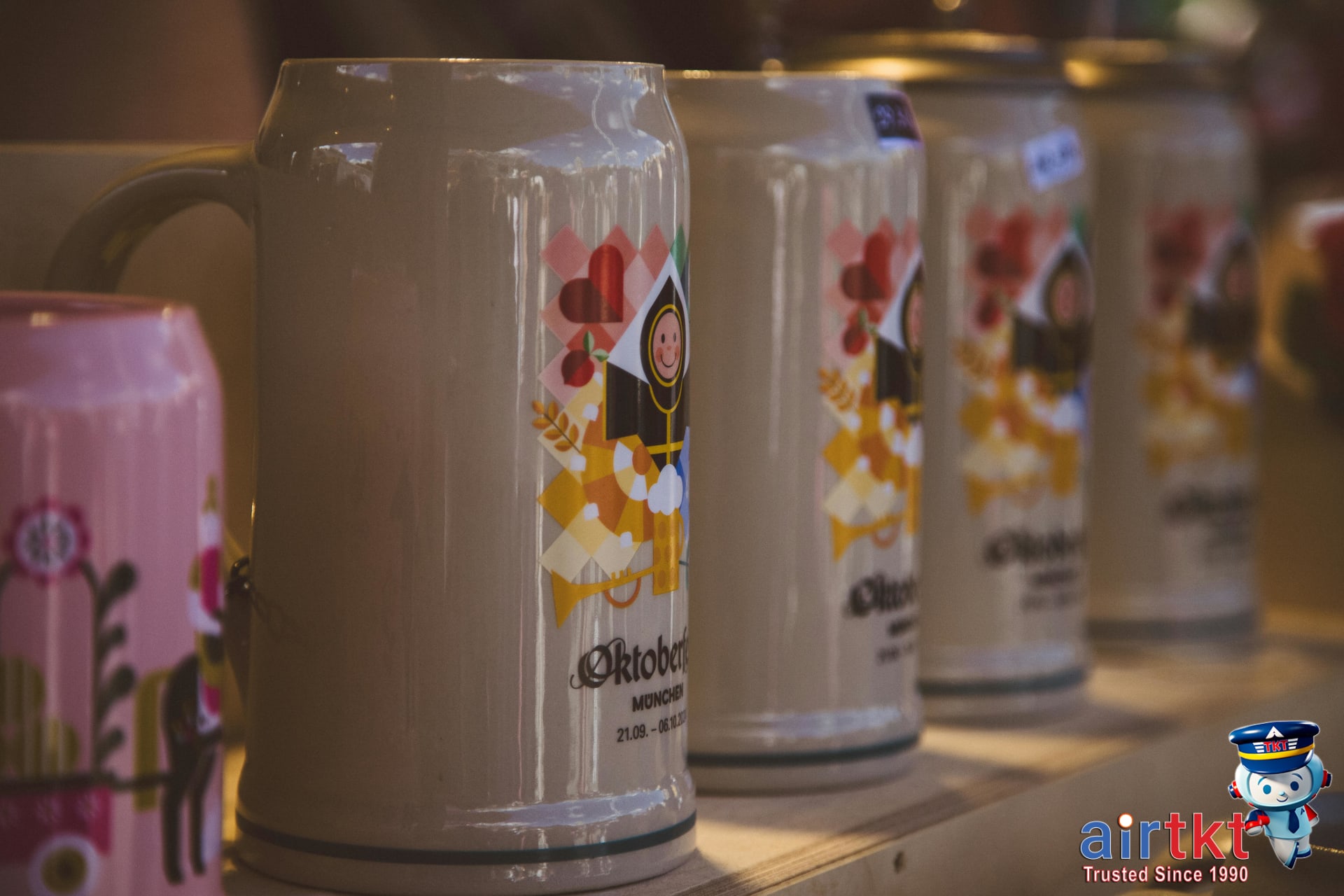 Traditional Bavarian food and large beer steins served at Oktoberfest Munich