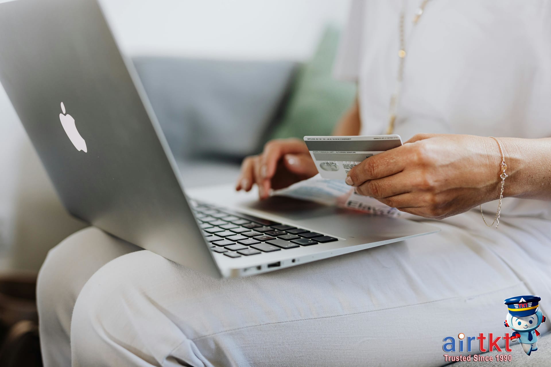 Person booking flights online using flash sale deals on website