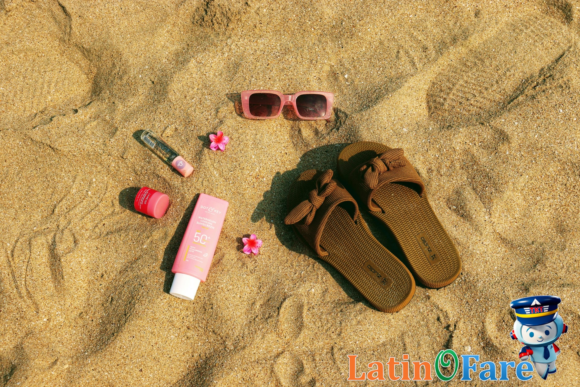 Colorful swimwear and sun hats for a tropical beach packing list