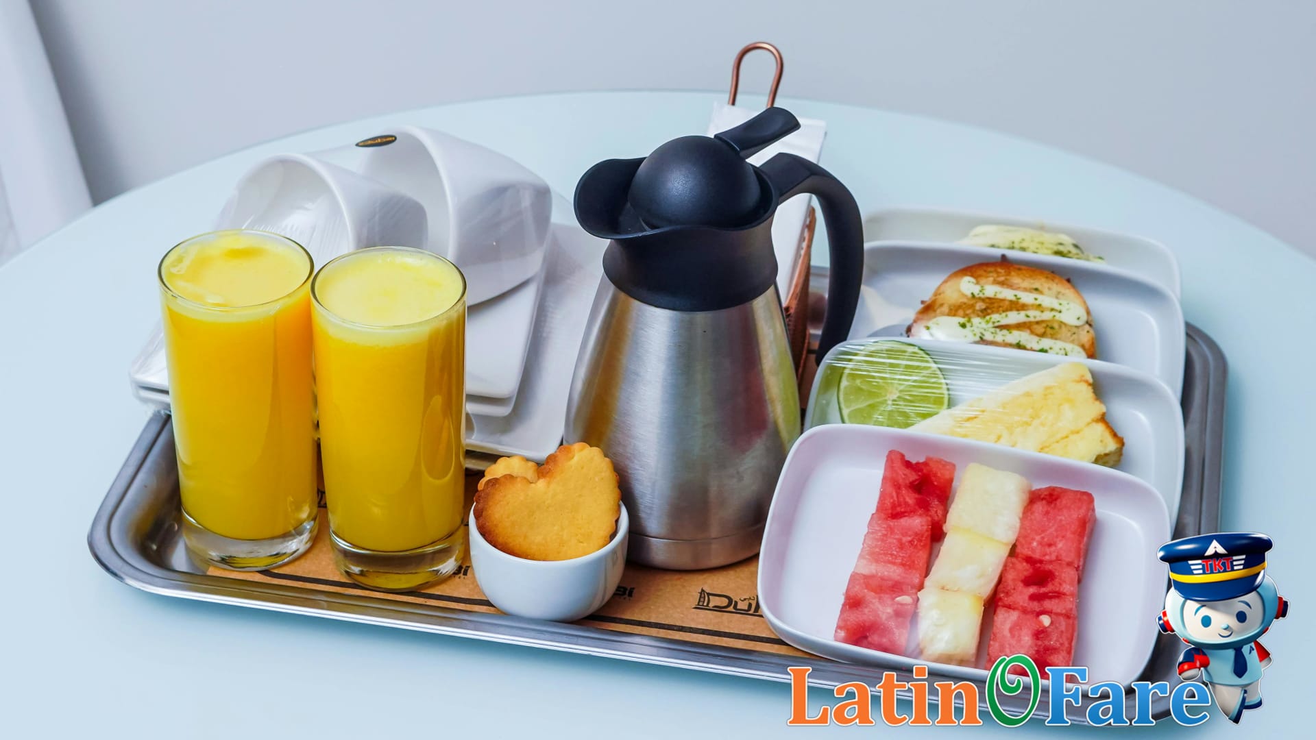 Guest enjoying complimentary breakfast at budget hotel while comparing hotel amenities options