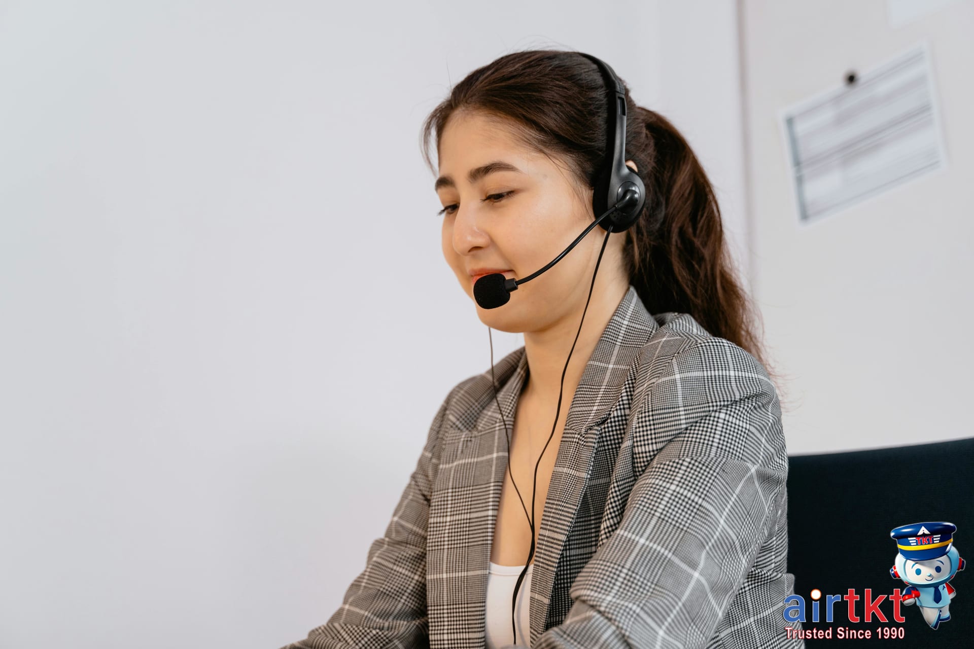 Customer support representative answering basic economy travel questions for travelers